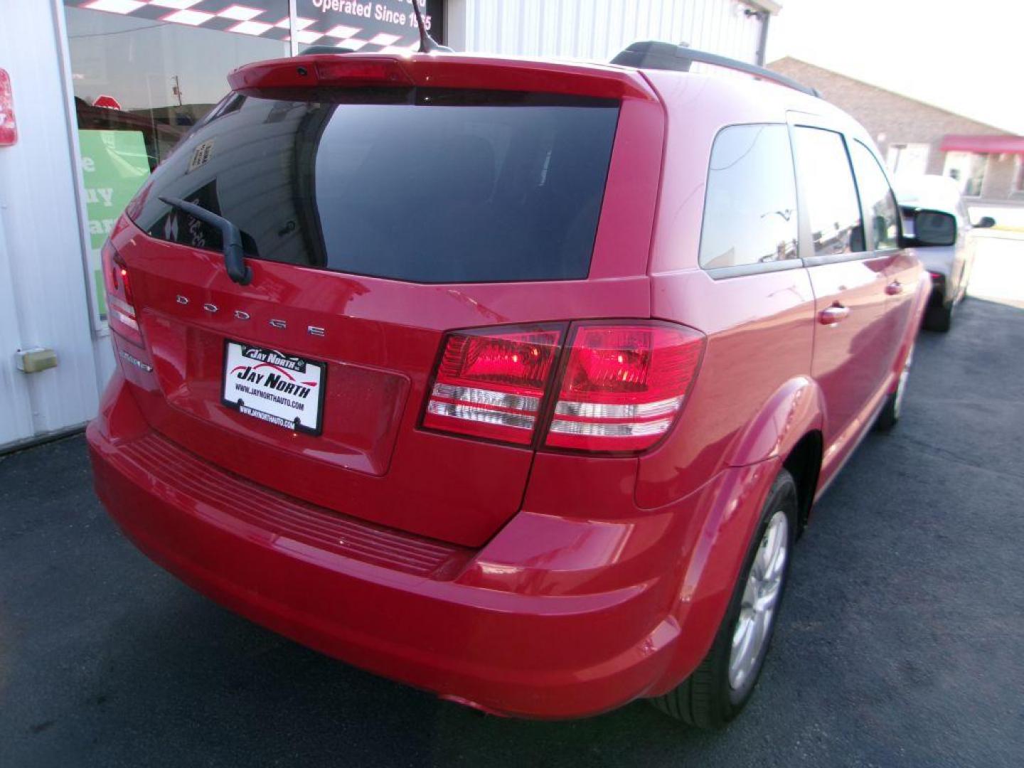2018 RED DODGE JOURNEY SE (3C4PDCAB5JT) with an 2.4L engine, Automatic transmission, located at 501 E. Columbia St., Springfield, OH, 45503, (800) 262-7122, 39.925262, -83.801796 - ***Regular Oil Changes on Carfax***CLEAN***SE***3rd Row Seating***Serviced and Detailed*** Jay North Auto has offered hand picked vehicles since 1965! Our customer's enjoy a NO pressure buying experience with a small town feel. All of our vehicles get fully inspected and detailed. We are a prefe - Photo#6