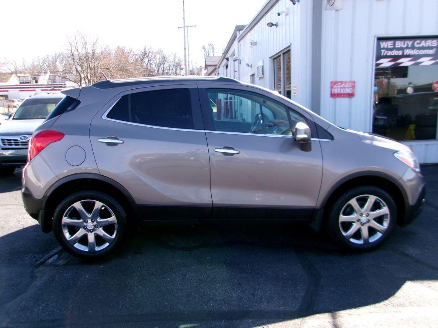 2014 BROWN BUICK ENCORE LEATHER GROUP (KL4CJGSB3EB) with an 1.4L engine, Automatic transmission, located at 501 E. Columbia St., Springfield, OH, 45503, (800) 262-7122, 39.925262, -83.801796 - *** New Turbo *** New Front Pads and Rotors *** Tune Up *** New Water Pump *** New Catalytic Converter *** Serviced and Detailed *** Leather *** Moonroof *** Remote Start *** Jay North Auto has offered hand picked vehicles since 1965! Our customer's enjoy a NO pressure buying experience with a - Photo#0