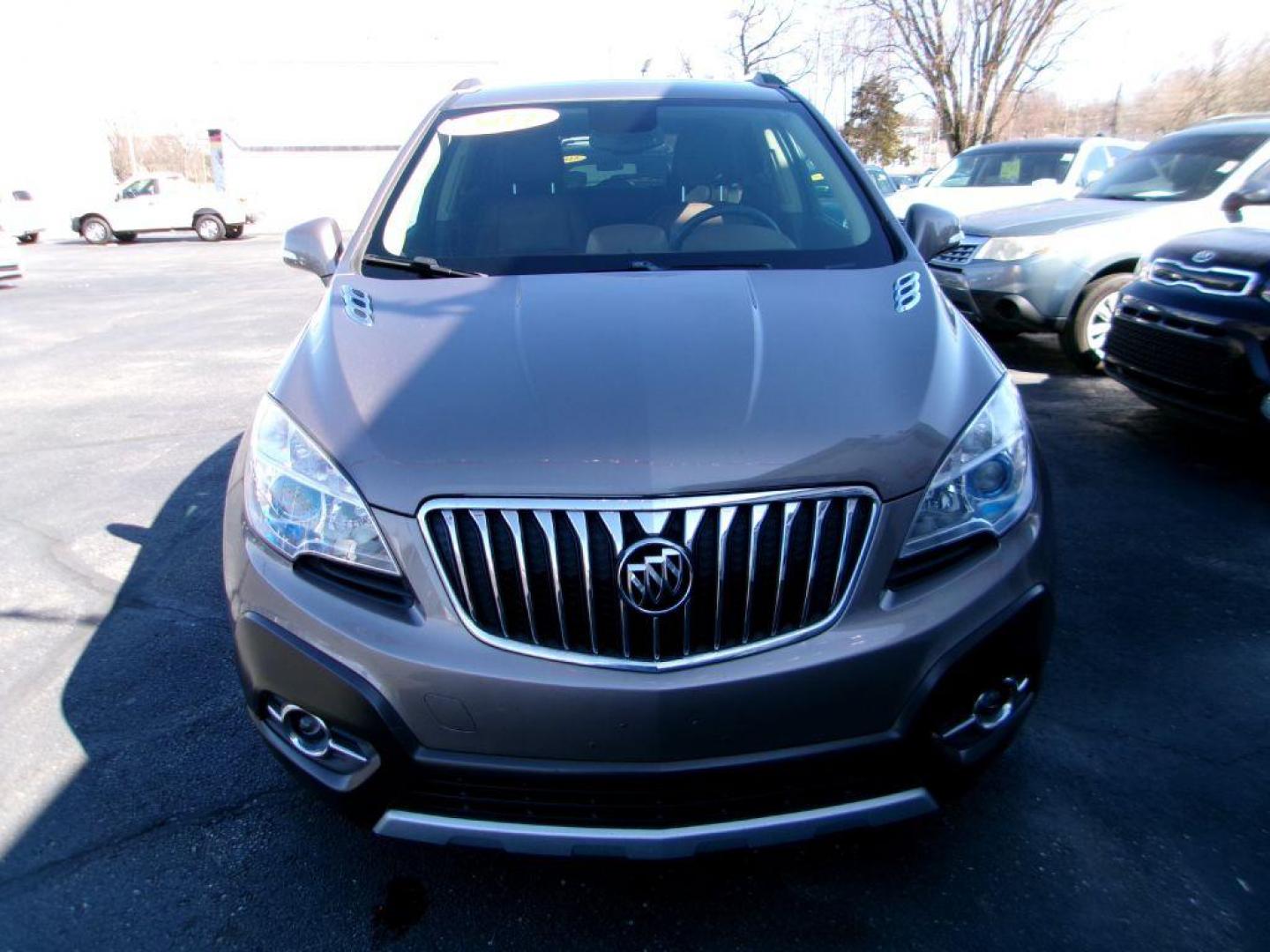2014 BROWN BUICK ENCORE LEATHER GROUP (KL4CJGSB3EB) with an 1.4L engine, Automatic transmission, located at 501 E. Columbia St., Springfield, OH, 45503, (800) 262-7122, 39.925262, -83.801796 - *** New Turbo *** New Front Pads and Rotors *** Tune Up *** New Water Pump *** New Catalytic Converter *** Serviced and Detailed *** Leather *** Moonroof *** Remote Start *** Jay North Auto has offered hand picked vehicles since 1965! Our customer's enjoy a NO pressure buying experience with a - Photo#1