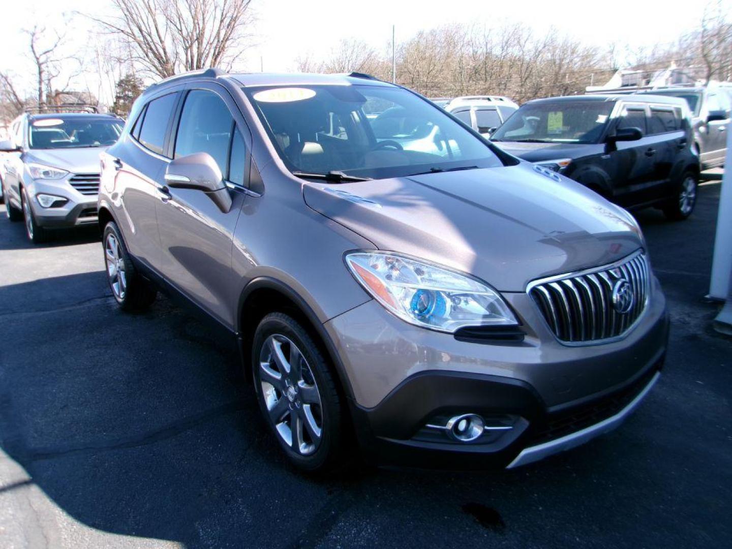 2014 BROWN BUICK ENCORE LEATHER GROUP (KL4CJGSB3EB) with an 1.4L engine, Automatic transmission, located at 501 E. Columbia St., Springfield, OH, 45503, (800) 262-7122, 39.925262, -83.801796 - *** New Turbo *** New Front Pads and Rotors *** Tune Up *** New Water Pump *** New Catalytic Converter *** Serviced and Detailed *** Leather *** Moonroof *** Remote Start *** Jay North Auto has offered hand picked vehicles since 1965! Our customer's enjoy a NO pressure buying experience with a - Photo#2