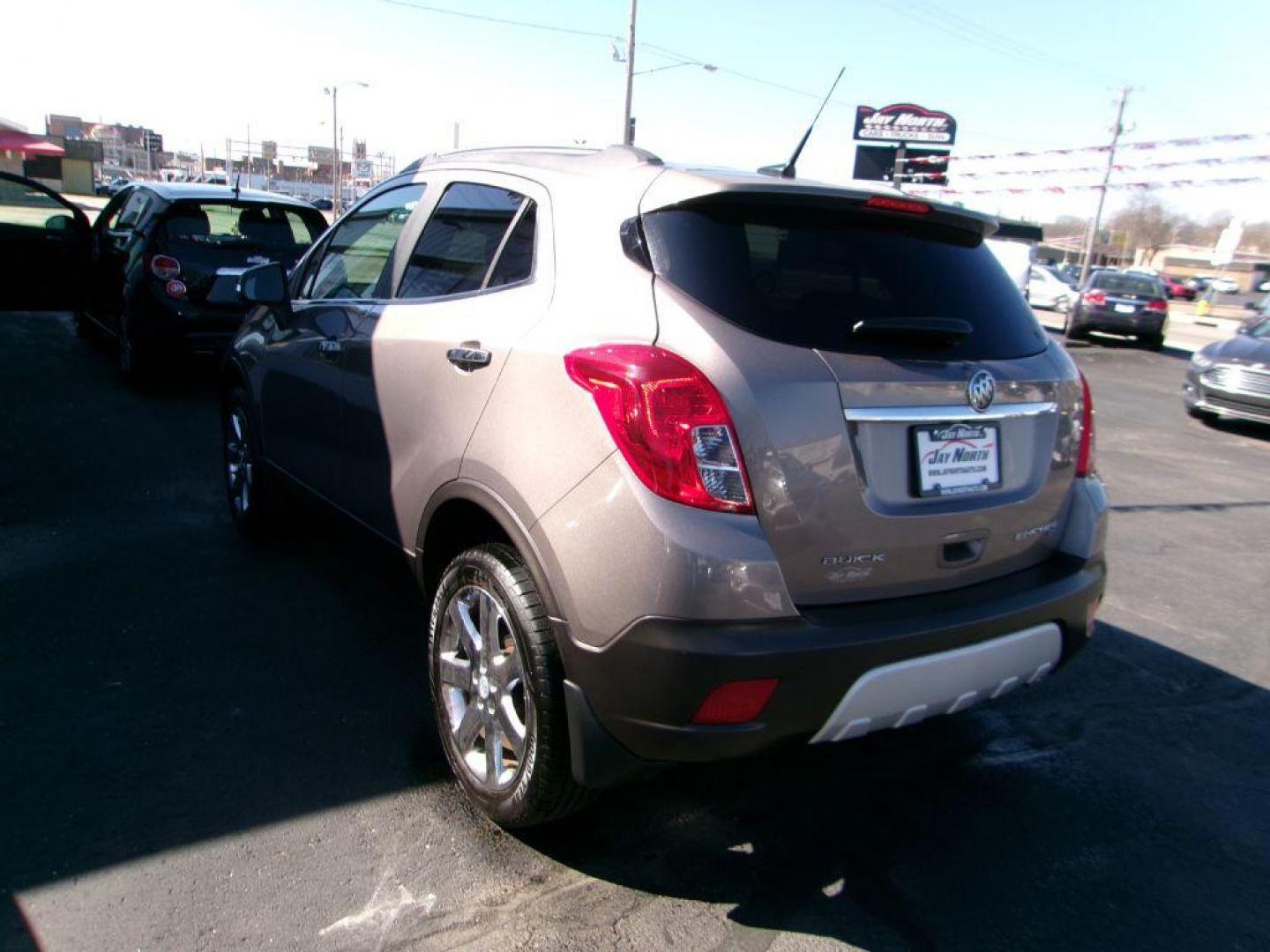 2014 BROWN BUICK ENCORE LEATHER GROUP (KL4CJGSB3EB) with an 1.4L engine, Automatic transmission, located at 501 E. Columbia St., Springfield, OH, 45503, (800) 262-7122, 39.925262, -83.801796 - *** New Turbo *** New Front Pads and Rotors *** Tune Up *** New Water Pump *** New Catalytic Converter *** Serviced and Detailed *** Leather *** Moonroof *** Remote Start *** Jay North Auto has offered hand picked vehicles since 1965! Our customer's enjoy a NO pressure buying experience with a - Photo#5