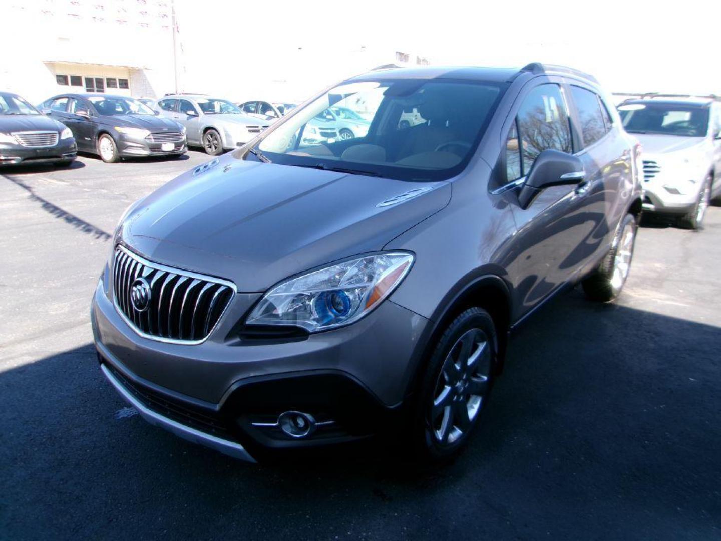 2014 BROWN BUICK ENCORE LEATHER GROUP (KL4CJGSB3EB) with an 1.4L engine, Automatic transmission, located at 501 E. Columbia St., Springfield, OH, 45503, (800) 262-7122, 39.925262, -83.801796 - *** New Turbo *** New Front Pads and Rotors *** Tune Up *** New Water Pump *** New Catalytic Converter *** Serviced and Detailed *** Leather *** Moonroof *** Remote Start *** Jay North Auto has offered hand picked vehicles since 1965! Our customer's enjoy a NO pressure buying experience with a - Photo#6