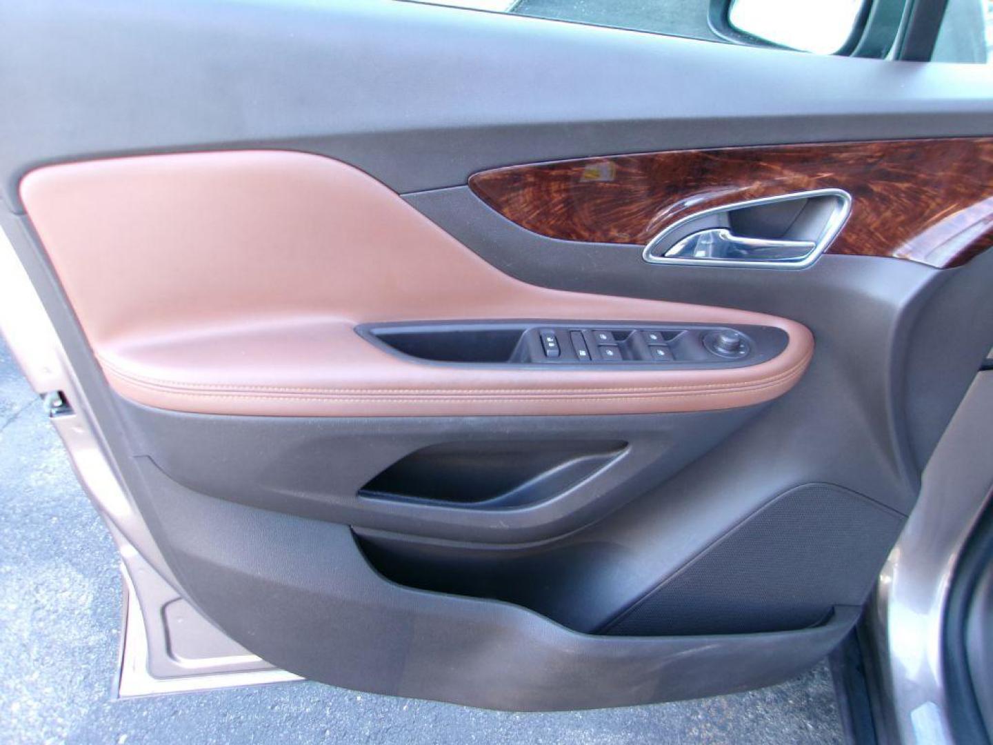 2014 BROWN BUICK ENCORE LEATHER GROUP (KL4CJGSB3EB) with an 1.4L engine, Automatic transmission, located at 501 E. Columbia St., Springfield, OH, 45503, (800) 262-7122, 39.925262, -83.801796 - *** New Turbo *** New Front Pads and Rotors *** Tune Up *** New Water Pump *** New Catalytic Converter *** Serviced and Detailed *** Leather *** Moonroof *** Remote Start *** Jay North Auto has offered hand picked vehicles since 1965! Our customer's enjoy a NO pressure buying experience with a - Photo#7