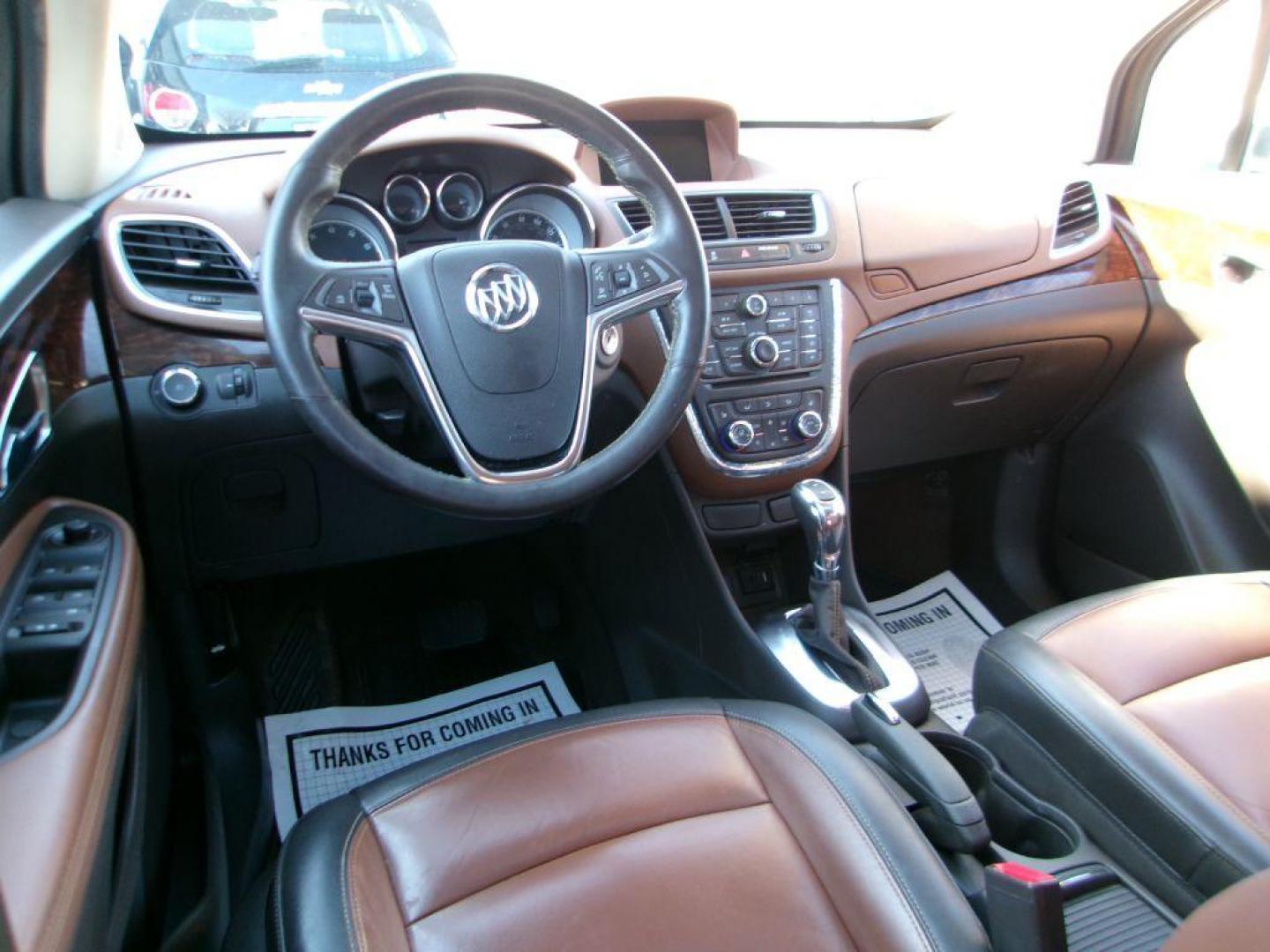 2014 BROWN BUICK ENCORE LEATHER GROUP (KL4CJGSB3EB) with an 1.4L engine, Automatic transmission, located at 501 E. Columbia St., Springfield, OH, 45503, (800) 262-7122, 39.925262, -83.801796 - *** New Turbo *** New Front Pads and Rotors *** Tune Up *** New Water Pump *** New Catalytic Converter *** Serviced and Detailed *** Leather *** Moonroof *** Remote Start *** Jay North Auto has offered hand picked vehicles since 1965! Our customer's enjoy a NO pressure buying experience with a - Photo#10