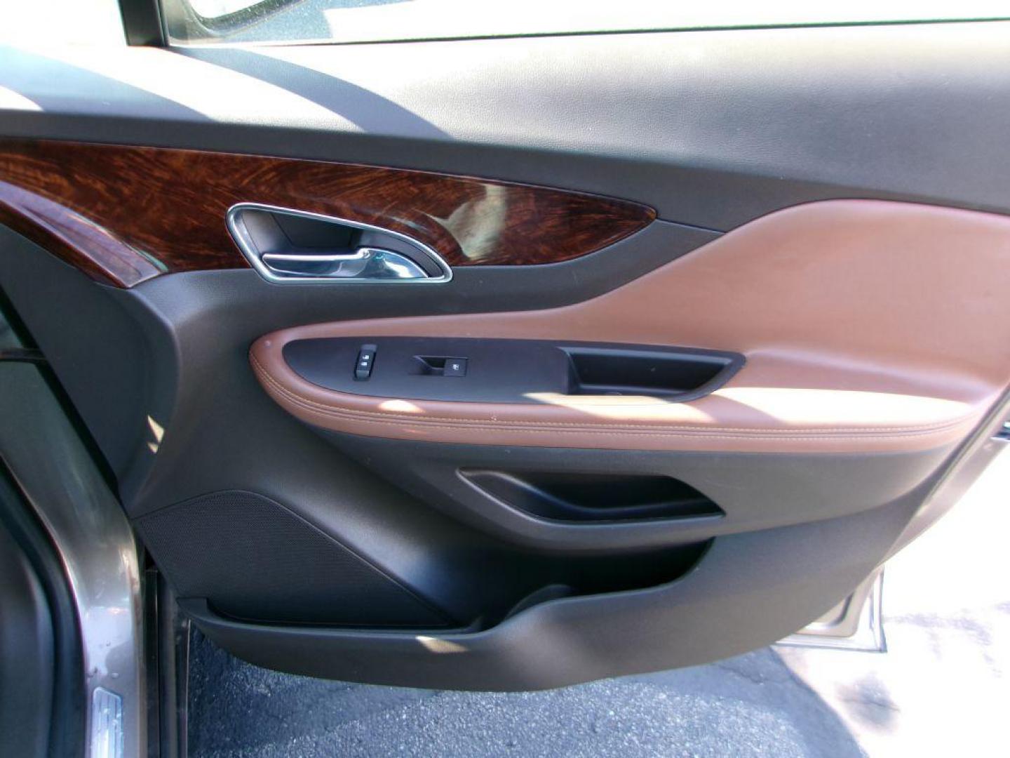 2014 BROWN BUICK ENCORE LEATHER GROUP (KL4CJGSB3EB) with an 1.4L engine, Automatic transmission, located at 501 E. Columbia St., Springfield, OH, 45503, (800) 262-7122, 39.925262, -83.801796 - *** New Turbo *** New Front Pads and Rotors *** Tune Up *** New Water Pump *** New Catalytic Converter *** Serviced and Detailed *** Leather *** Moonroof *** Remote Start *** Jay North Auto has offered hand picked vehicles since 1965! Our customer's enjoy a NO pressure buying experience with a - Photo#16