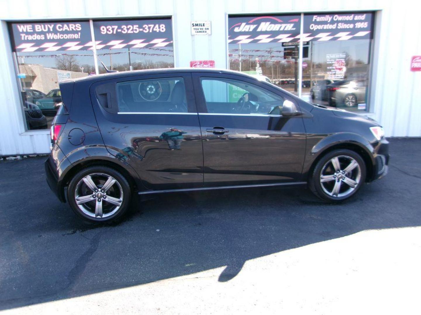 2014 BLACK CHEVROLET SONIC RS (1G1JH6SB3E4) with an 1.4L engine, 5-Speed Manual transmission, located at 501 E. Columbia St., Springfield, OH, 45503, (800) 262-7122, 39.925262, -83.801796 - *** RS *** Leather Seating *** Serviced and Detailed *** Manual Transmission *** NICE *** Jay North Auto has offered hand picked vehicles since 1965! Our customer's enjoy a NO pressure buying experience with a small town feel. All of our vehicles get fully inspected and detailed. We are a prefe - Photo#0