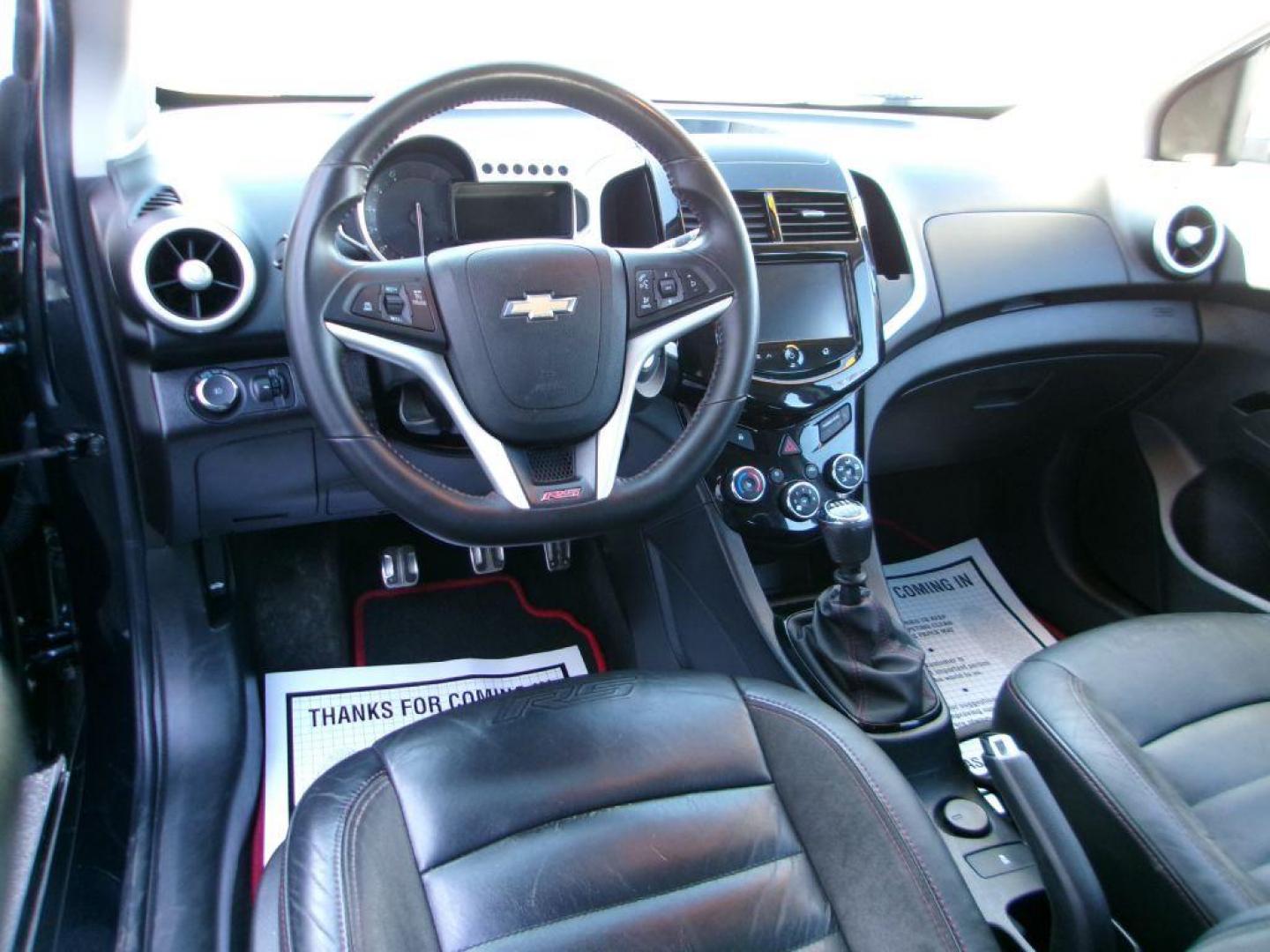 2014 BLACK CHEVROLET SONIC RS (1G1JH6SB3E4) with an 1.4L engine, 5-Speed Manual transmission, located at 501 E. Columbia St., Springfield, OH, 45503, (800) 262-7122, 39.925262, -83.801796 - *** RS *** Leather Seating *** Serviced and Detailed *** Manual Transmission *** NICE *** Jay North Auto has offered hand picked vehicles since 1965! Our customer's enjoy a NO pressure buying experience with a small town feel. All of our vehicles get fully inspected and detailed. We are a prefe - Photo#9