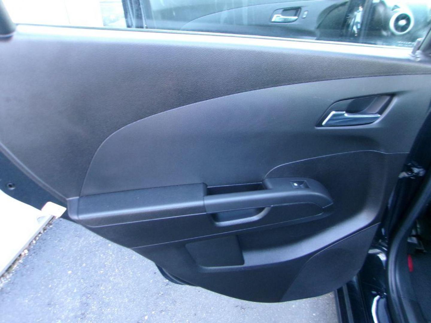 2014 BLACK CHEVROLET SONIC RS (1G1JH6SB3E4) with an 1.4L engine, 5-Speed Manual transmission, located at 501 E. Columbia St., Springfield, OH, 45503, (800) 262-7122, 39.925262, -83.801796 - *** RS *** Leather Seating *** Serviced and Detailed *** Manual Transmission *** NICE *** Jay North Auto has offered hand picked vehicles since 1965! Our customer's enjoy a NO pressure buying experience with a small town feel. All of our vehicles get fully inspected and detailed. We are a prefe - Photo#10