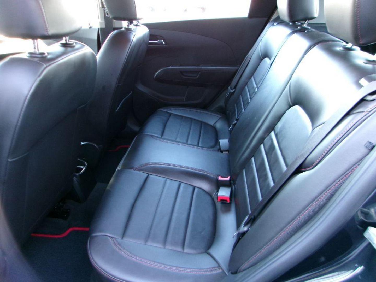 2014 BLACK CHEVROLET SONIC RS (1G1JH6SB3E4) with an 1.4L engine, 5-Speed Manual transmission, located at 501 E. Columbia St., Springfield, OH, 45503, (800) 262-7122, 39.925262, -83.801796 - *** RS *** Leather Seating *** Serviced and Detailed *** Manual Transmission *** NICE *** Jay North Auto has offered hand picked vehicles since 1965! Our customer's enjoy a NO pressure buying experience with a small town feel. All of our vehicles get fully inspected and detailed. We are a prefe - Photo#11