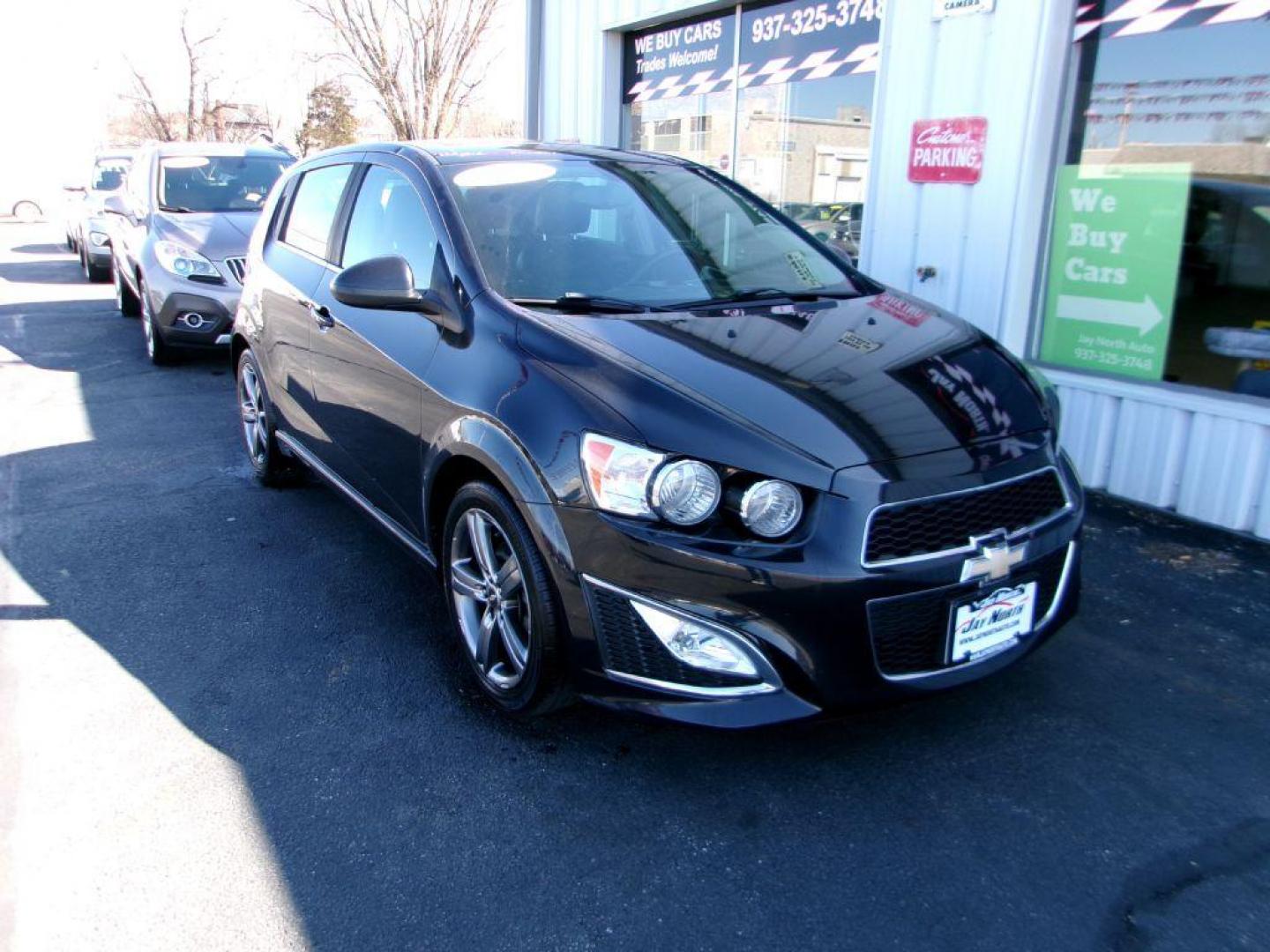 2014 BLACK CHEVROLET SONIC RS (1G1JH6SB3E4) with an 1.4L engine, 5-Speed Manual transmission, located at 501 E. Columbia St., Springfield, OH, 45503, (800) 262-7122, 39.925262, -83.801796 - *** RS *** Leather Seating *** Serviced and Detailed *** Manual Transmission *** NICE *** Jay North Auto has offered hand picked vehicles since 1965! Our customer's enjoy a NO pressure buying experience with a small town feel. All of our vehicles get fully inspected and detailed. We are a prefe - Photo#2
