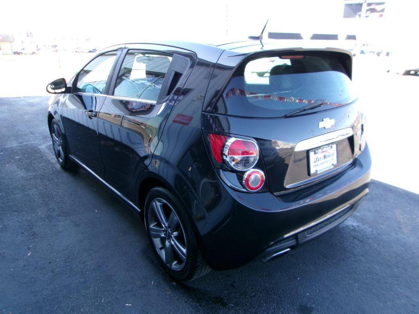 2014 BLACK CHEVROLET SONIC RS (1G1JH6SB3E4) with an 1.4L engine, 5-Speed Manual transmission, located at 501 E. Columbia St., Springfield, OH, 45503, (800) 262-7122, 39.925262, -83.801796 - *** RS *** Leather Seating *** Serviced and Detailed *** Manual Transmission *** NICE *** Jay North Auto has offered hand picked vehicles since 1965! Our customer's enjoy a NO pressure buying experience with a small town feel. All of our vehicles get fully inspected and detailed. We are a prefe - Photo#5