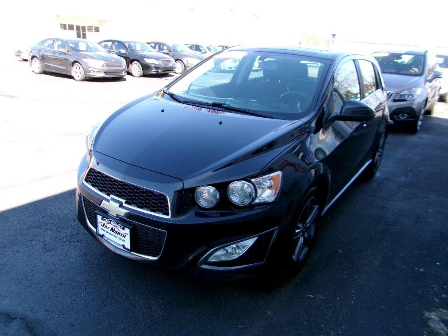2014 BLACK CHEVROLET SONIC RS (1G1JH6SB3E4) with an 1.4L engine, 5-Speed Manual transmission, located at 501 E. Columbia St., Springfield, OH, 45503, (800) 262-7122, 39.925262, -83.801796 - *** RS *** Leather Seating *** Serviced and Detailed *** Manual Transmission *** NICE *** Jay North Auto has offered hand picked vehicles since 1965! Our customer's enjoy a NO pressure buying experience with a small town feel. All of our vehicles get fully inspected and detailed. We are a prefe - Photo#6