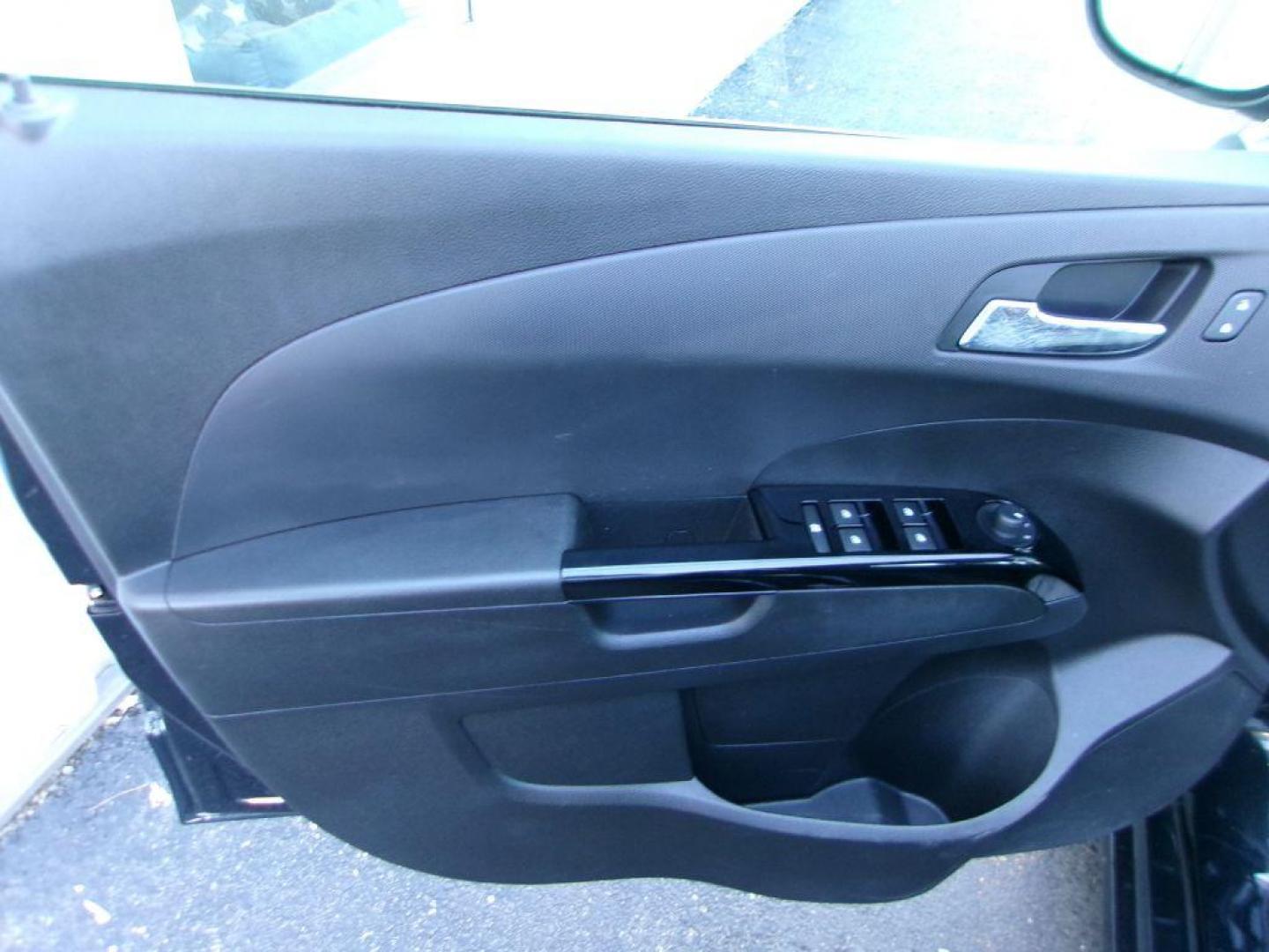 2014 BLACK CHEVROLET SONIC RS (1G1JH6SB3E4) with an 1.4L engine, 5-Speed Manual transmission, located at 501 E. Columbia St., Springfield, OH, 45503, (800) 262-7122, 39.925262, -83.801796 - *** RS *** Leather Seating *** Serviced and Detailed *** Manual Transmission *** NICE *** Jay North Auto has offered hand picked vehicles since 1965! Our customer's enjoy a NO pressure buying experience with a small town feel. All of our vehicles get fully inspected and detailed. We are a prefe - Photo#7
