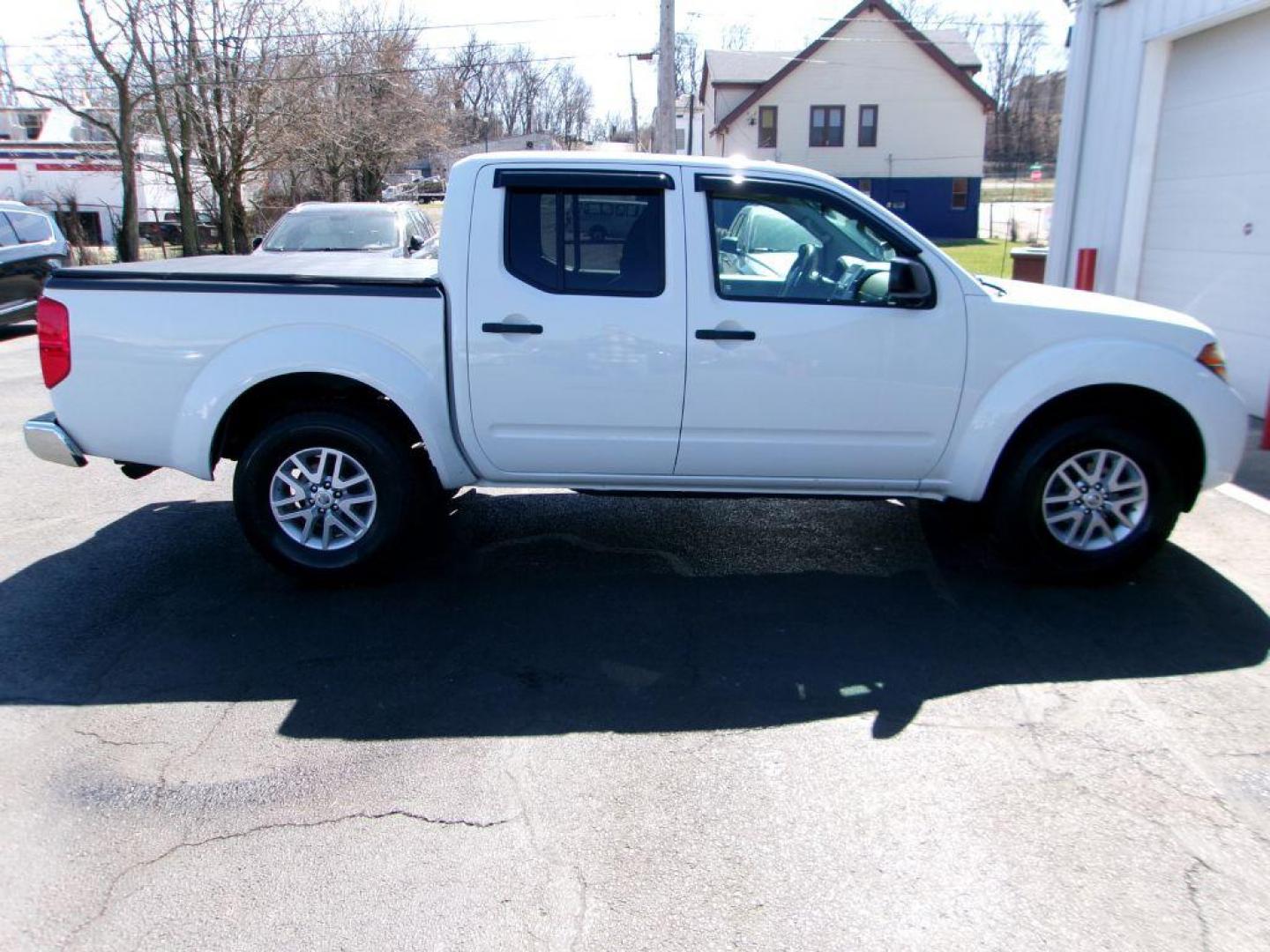 2016 WHITE NISSAN FRONTIER SV (1N6AD0EV7GN) with an 4.0L engine, Automatic transmission, located at 501 E. Columbia St., Springfield, OH, 45503, (800) 262-7122, 39.925262, -83.801796 - *** SV *** New Tires *** 4x4 *** Serviced and Detailed *** 4.0L V6 *** Clean CarFax *** Jay North Auto has offered hand picked vehicles since 1965! Our customer's enjoy a NO pressure buying experience with a small town feel. All of our vehicles get fully inspected and detailed. We are a preferr - Photo#0