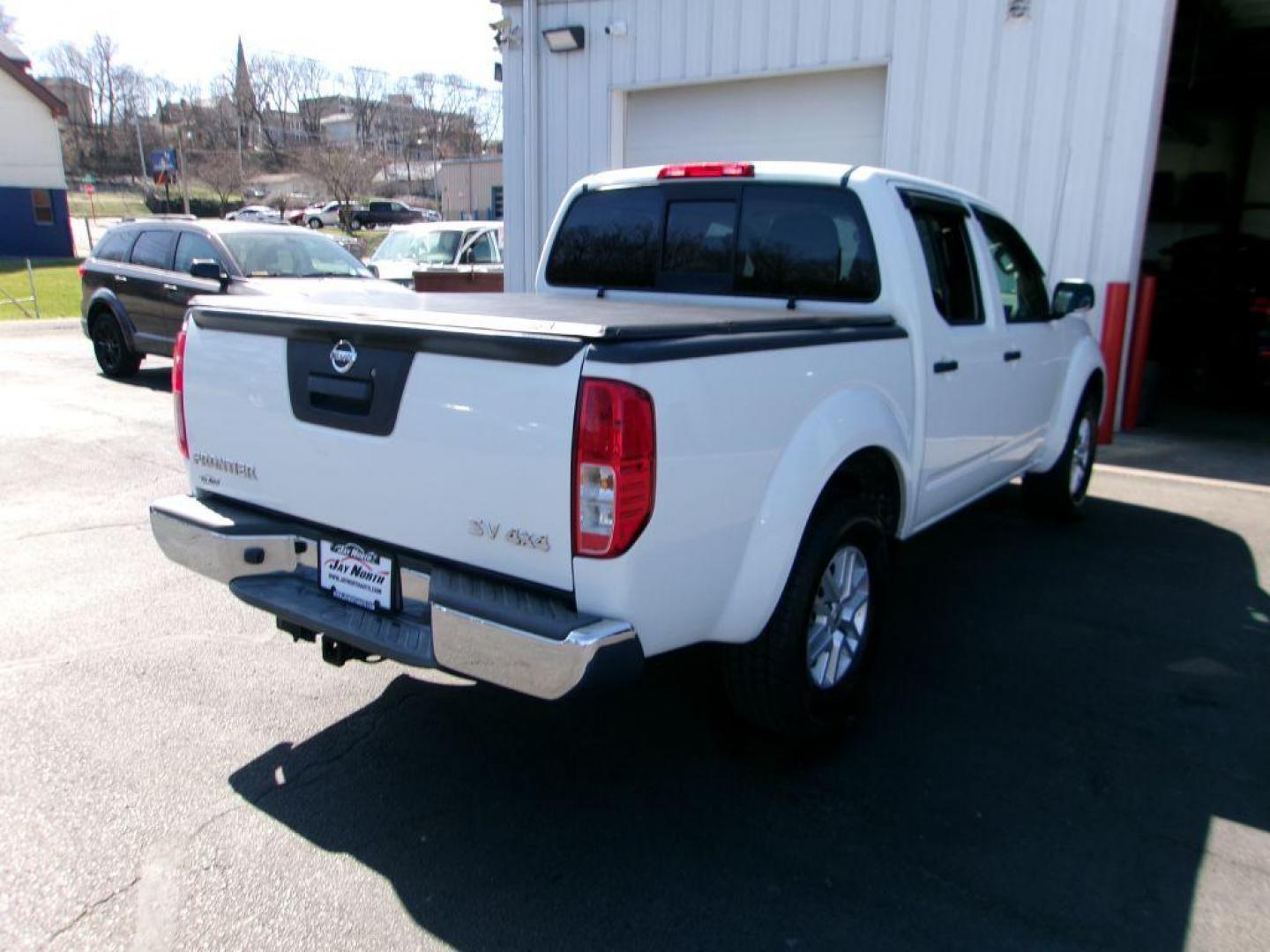 2016 WHITE NISSAN FRONTIER SV (1N6AD0EV7GN) with an 4.0L engine, Automatic transmission, located at 501 E. Columbia St., Springfield, OH, 45503, (800) 262-7122, 39.925262, -83.801796 - *** SV *** New Tires *** 4x4 *** Serviced and Detailed *** 4.0L V6 *** Clean CarFax *** Jay North Auto has offered hand picked vehicles since 1965! Our customer's enjoy a NO pressure buying experience with a small town feel. All of our vehicles get fully inspected and detailed. We are a preferr - Photo#3