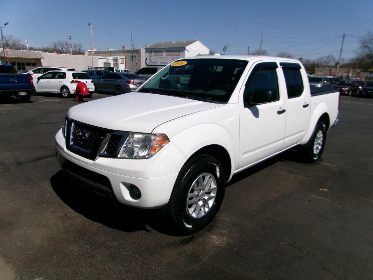 2016 WHITE NISSAN FRONTIER SV (1N6AD0EV7GN) with an 4.0L engine, Automatic transmission, located at 501 E. Columbia St., Springfield, OH, 45503, (800) 262-7122, 39.925262, -83.801796 - *** SV *** New Tires *** 4x4 *** Serviced and Detailed *** 4.0L V6 *** Clean CarFax *** Jay North Auto has offered hand picked vehicles since 1965! Our customer's enjoy a NO pressure buying experience with a small town feel. All of our vehicles get fully inspected and detailed. We are a preferr - Photo#7