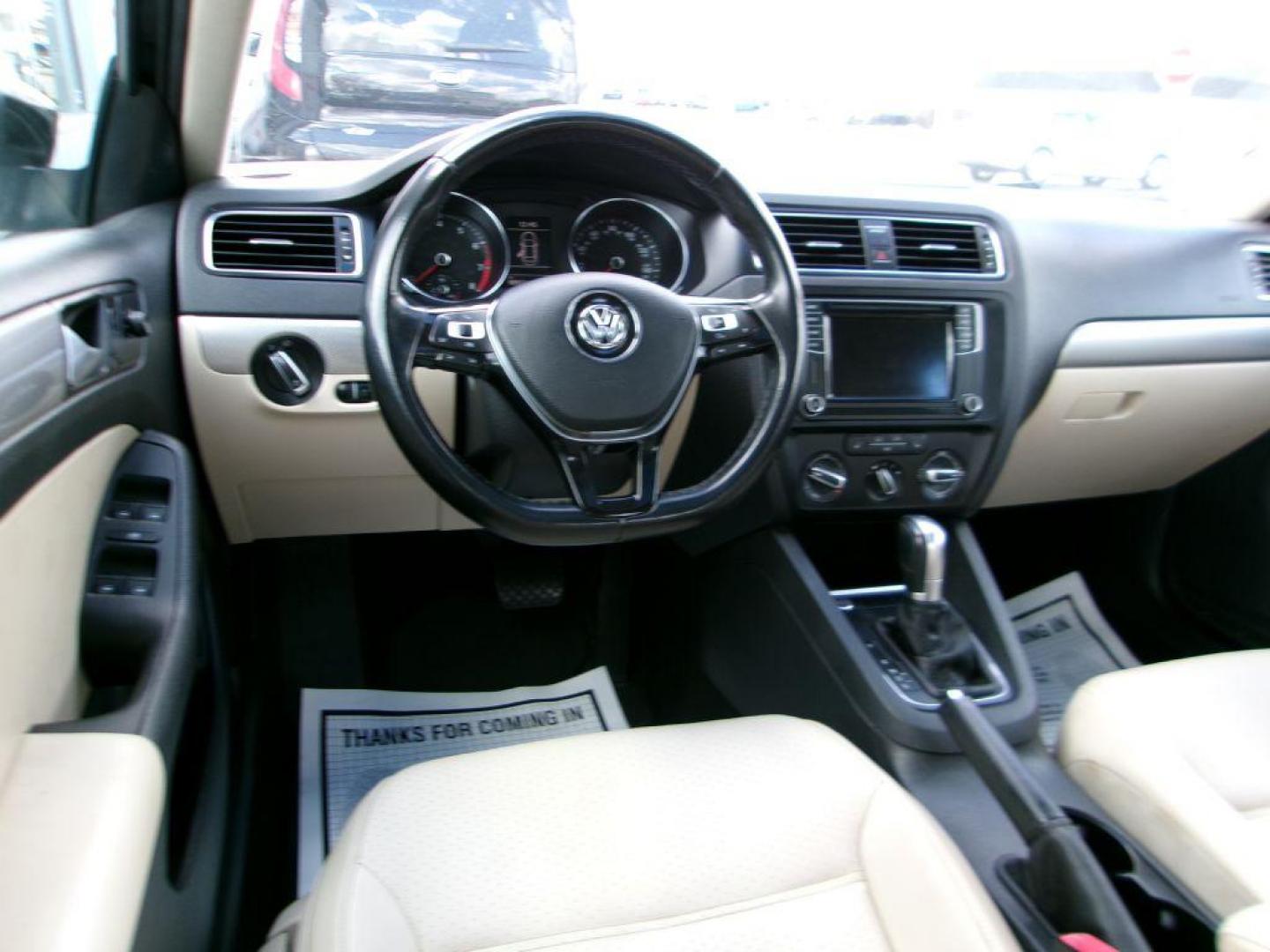 2017 BLACK VOLKSWAGEN JETTA SE (3VWDB7AJ8HM) with an 1.4L engine, Automatic transmission, located at 501 E. Columbia St., Springfield, OH, 45503, (800) 262-7122, 39.925262, -83.801796 - *** New Tires *** Serviced and Detailed *** New Brakes *** SE *** Moonroof *** Leather *** Jay North Auto has offered hand picked vehicles since 1965! Our customer's enjoy a NO pressure buying experience with a small town feel. All of our vehicles get fully inspected and detailed. We are a pref - Photo#10