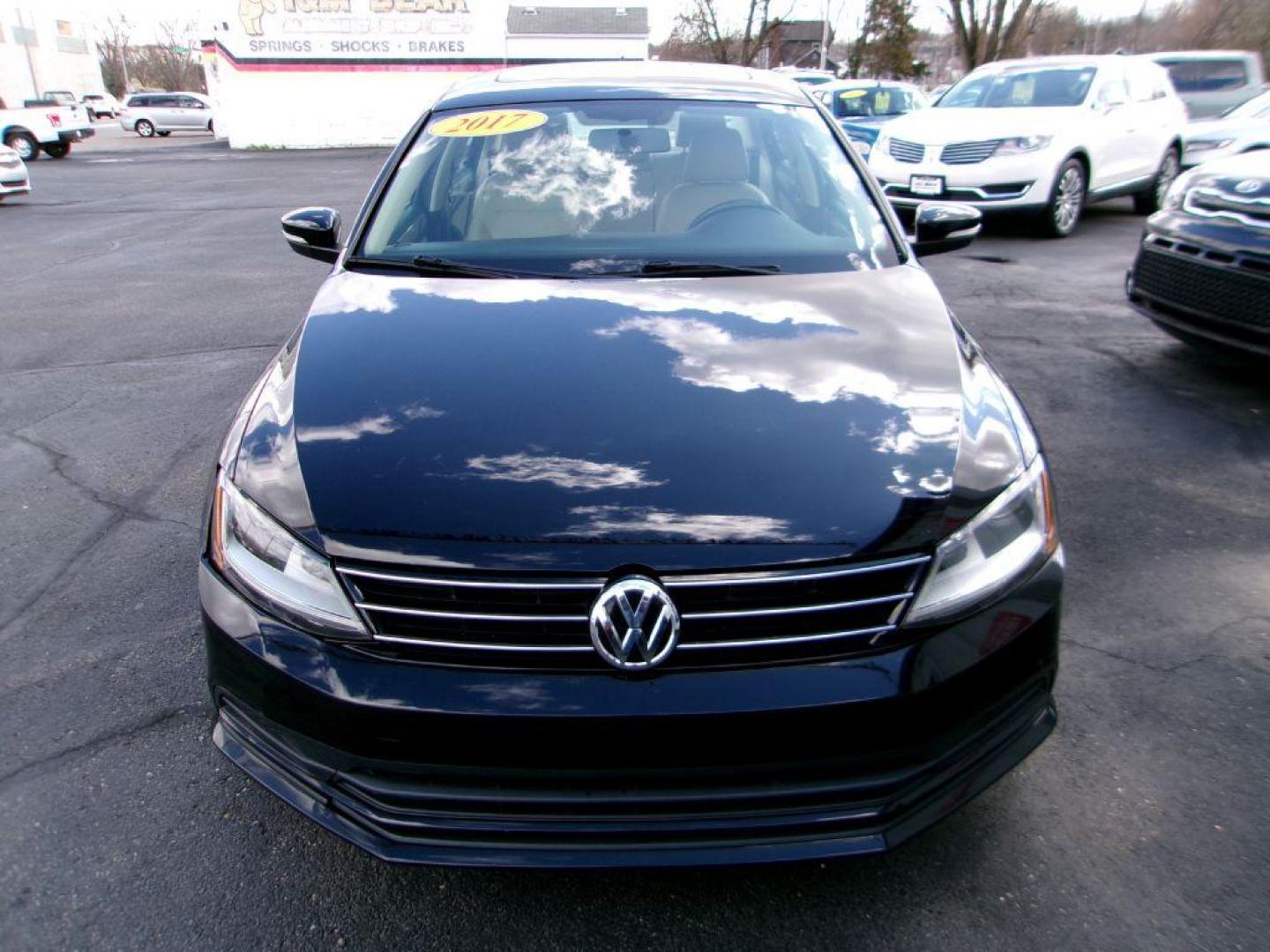 2017 BLACK VOLKSWAGEN JETTA SE (3VWDB7AJ8HM) with an 1.4L engine, Automatic transmission, located at 501 E. Columbia St., Springfield, OH, 45503, (800) 262-7122, 39.925262, -83.801796 - *** New Tires *** Serviced and Detailed *** New Brakes *** SE *** Moonroof *** Leather *** Jay North Auto has offered hand picked vehicles since 1965! Our customer's enjoy a NO pressure buying experience with a small town feel. All of our vehicles get fully inspected and detailed. We are a pref - Photo#1