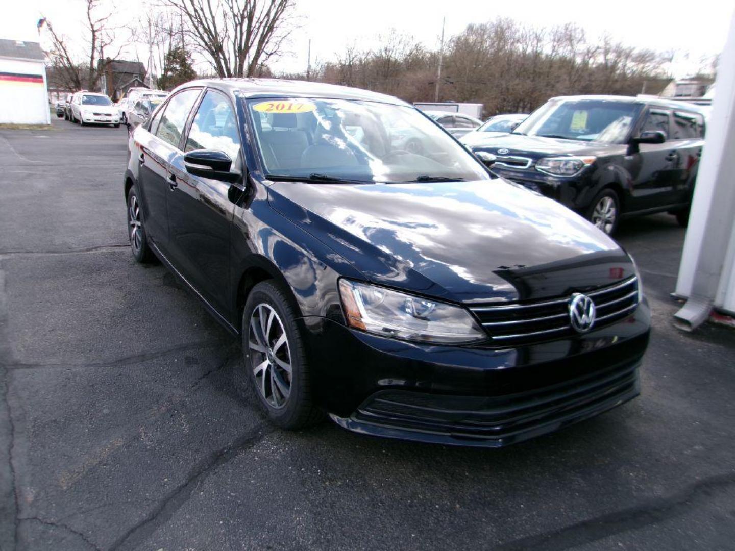 2017 BLACK VOLKSWAGEN JETTA SE (3VWDB7AJ8HM) with an 1.4L engine, Automatic transmission, located at 501 E. Columbia St., Springfield, OH, 45503, (800) 262-7122, 39.925262, -83.801796 - *** New Tires *** Serviced and Detailed *** New Brakes *** SE *** Moonroof *** Leather *** Jay North Auto has offered hand picked vehicles since 1965! Our customer's enjoy a NO pressure buying experience with a small town feel. All of our vehicles get fully inspected and detailed. We are a pref - Photo#2