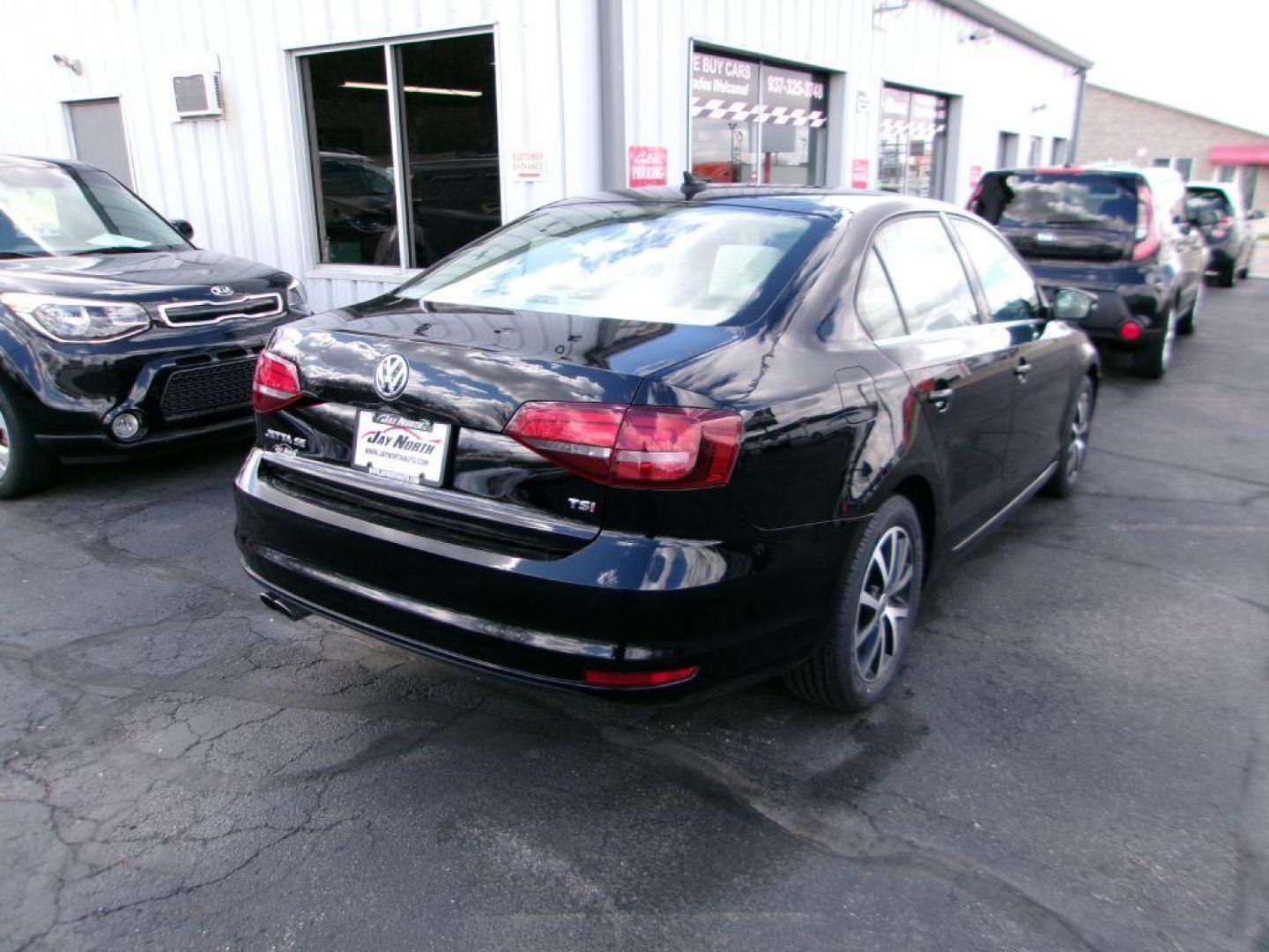 2017 BLACK VOLKSWAGEN JETTA SE (3VWDB7AJ8HM) with an 1.4L engine, Automatic transmission, located at 501 E. Columbia St., Springfield, OH, 45503, (800) 262-7122, 39.925262, -83.801796 - *** New Tires *** Serviced and Detailed *** New Brakes *** SE *** Moonroof *** Leather *** Jay North Auto has offered hand picked vehicles since 1965! Our customer's enjoy a NO pressure buying experience with a small town feel. All of our vehicles get fully inspected and detailed. We are a pref - Photo#3
