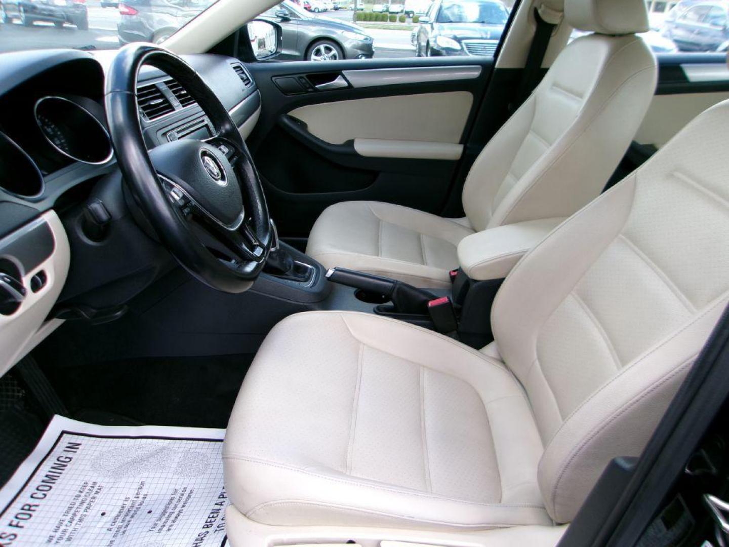 2017 BLACK VOLKSWAGEN JETTA SE (3VWDB7AJ8HM) with an 1.4L engine, Automatic transmission, located at 501 E. Columbia St., Springfield, OH, 45503, (800) 262-7122, 39.925262, -83.801796 - *** New Tires *** Serviced and Detailed *** New Brakes *** SE *** Moonroof *** Leather *** Jay North Auto has offered hand picked vehicles since 1965! Our customer's enjoy a NO pressure buying experience with a small town feel. All of our vehicles get fully inspected and detailed. We are a pref - Photo#8