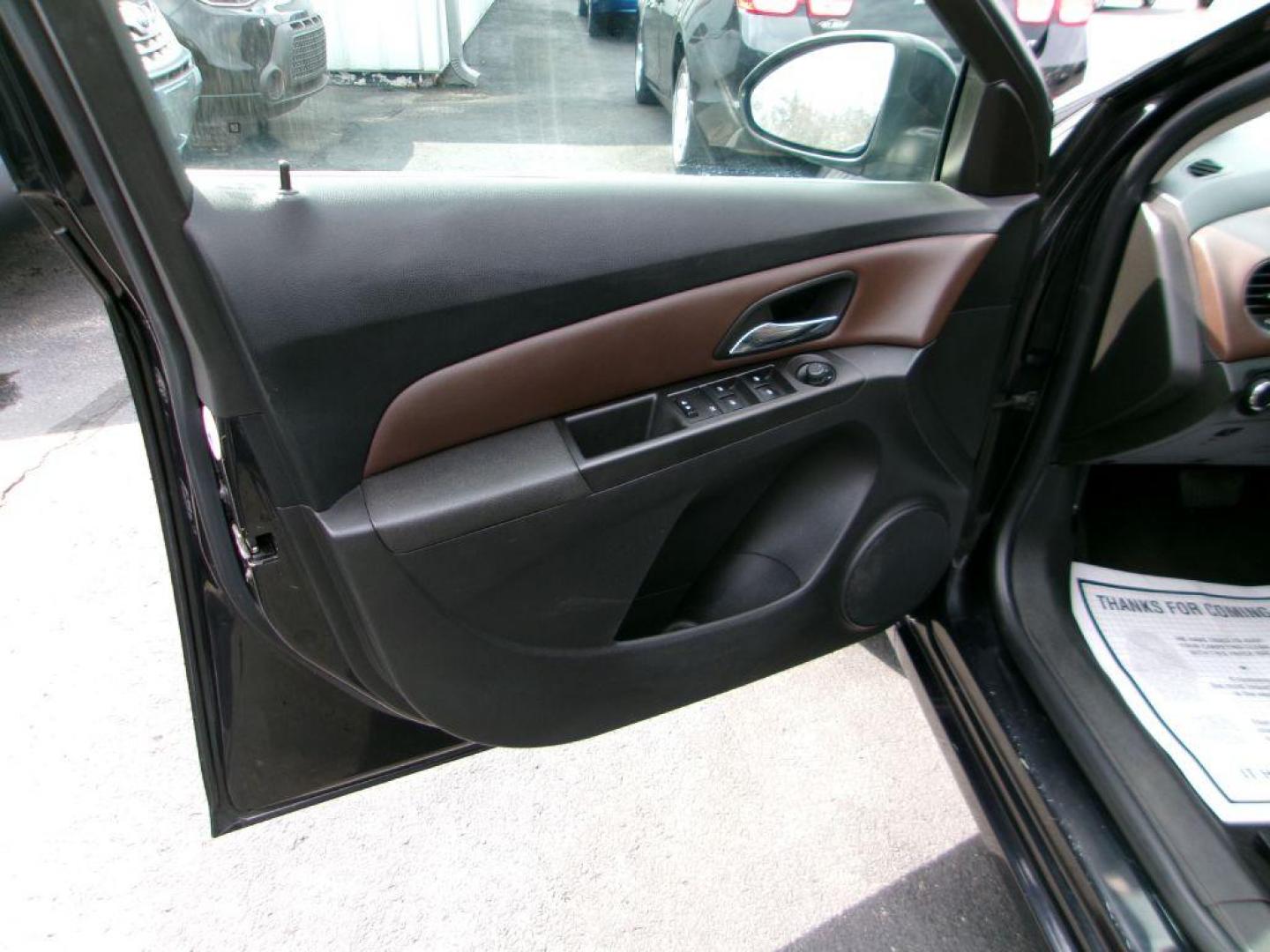 2015 BLACK CHEVROLET CRUZE LT (1G1PE5SBXF7) with an 1.4L engine, Automatic transmission, located at 501 E. Columbia St., Springfield, OH, 45503, (800) 262-7122, 39.925262, -83.801796 - *** New Tires *** Serviced and Detailed *** New Turbo and Cooling lines *** LT *** Remote Start *** Premium Audio *** Jay North Auto has offered hand picked vehicles since 1965! Our customer's enjoy a NO pressure buying experience with a small town feel. All of our vehicles get fully inspected - Photo#9