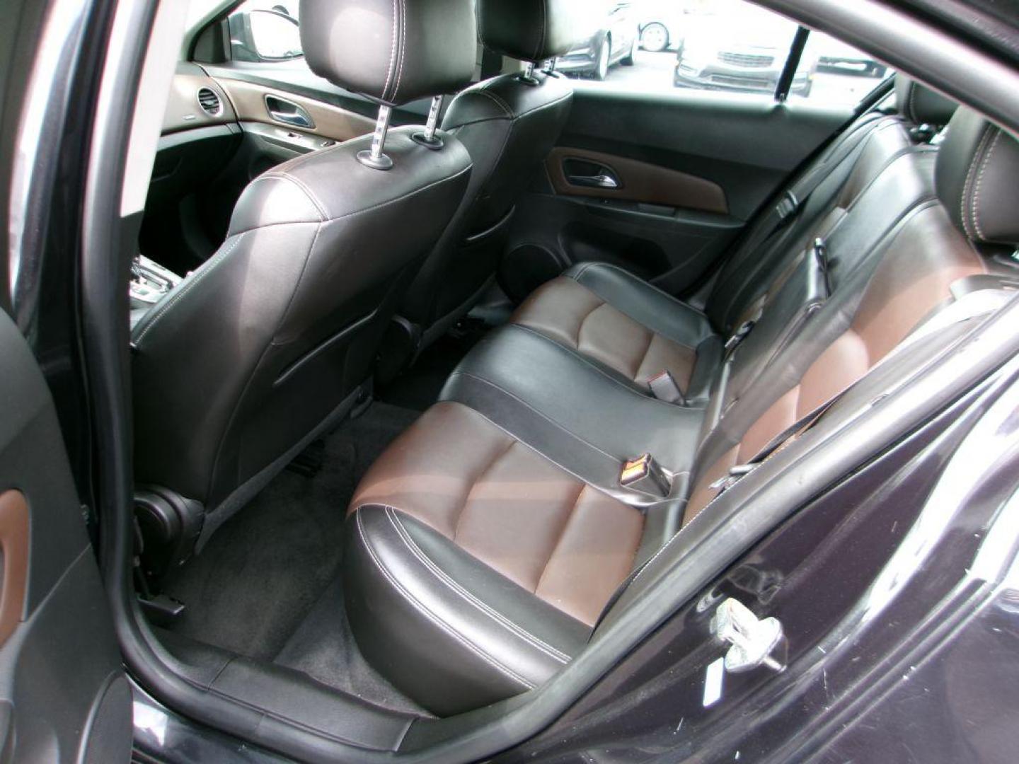 2015 BLACK CHEVROLET CRUZE LT (1G1PE5SBXF7) with an 1.4L engine, Automatic transmission, located at 501 E. Columbia St., Springfield, OH, 45503, (800) 262-7122, 39.925262, -83.801796 - *** New Tires *** Serviced and Detailed *** New Turbo and Cooling lines *** LT *** Remote Start *** Premium Audio *** Jay North Auto has offered hand picked vehicles since 1965! Our customer's enjoy a NO pressure buying experience with a small town feel. All of our vehicles get fully inspected - Photo#7