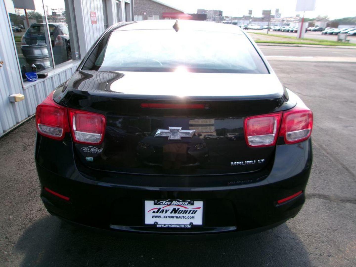 2014 BLACK CHEVROLET MALIBU 1LT (1G11C5SL3EF) with an 2.5L engine, Automatic transmission, located at 501 E. Columbia St., Springfield, OH, 45503, (800) 262-7122, 39.925262, -83.801796 - *** New Tires *** Serviced and Detailed *** Low Miles *** NICE!!! *** Jay North Auto has offered hand picked vehicles since 1965! Our customer's enjoy a NO pressure buying experience with a small town feel. All of our vehicles get fully inspected and detailed. We are a preferred dealer for many - Photo#4