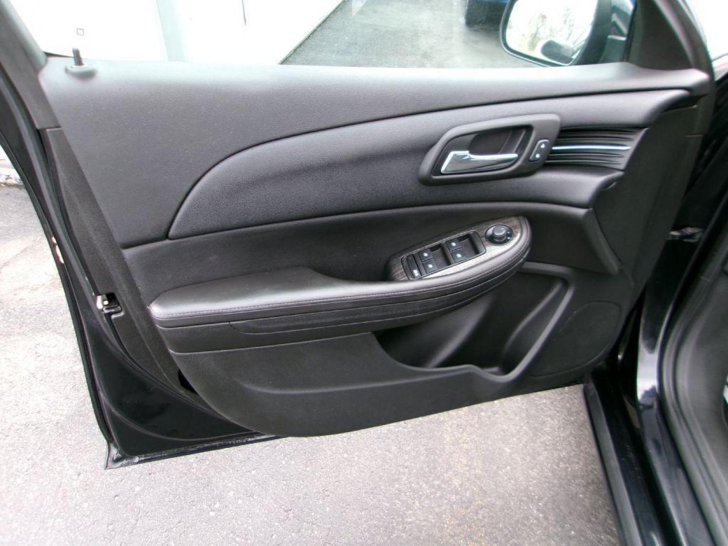 2014 BLACK CHEVROLET MALIBU 1LT (1G11C5SL3EF) with an 2.5L engine, Automatic transmission, located at 501 E. Columbia St., Springfield, OH, 45503, (800) 262-7122, 39.925262, -83.801796 - Photo#9