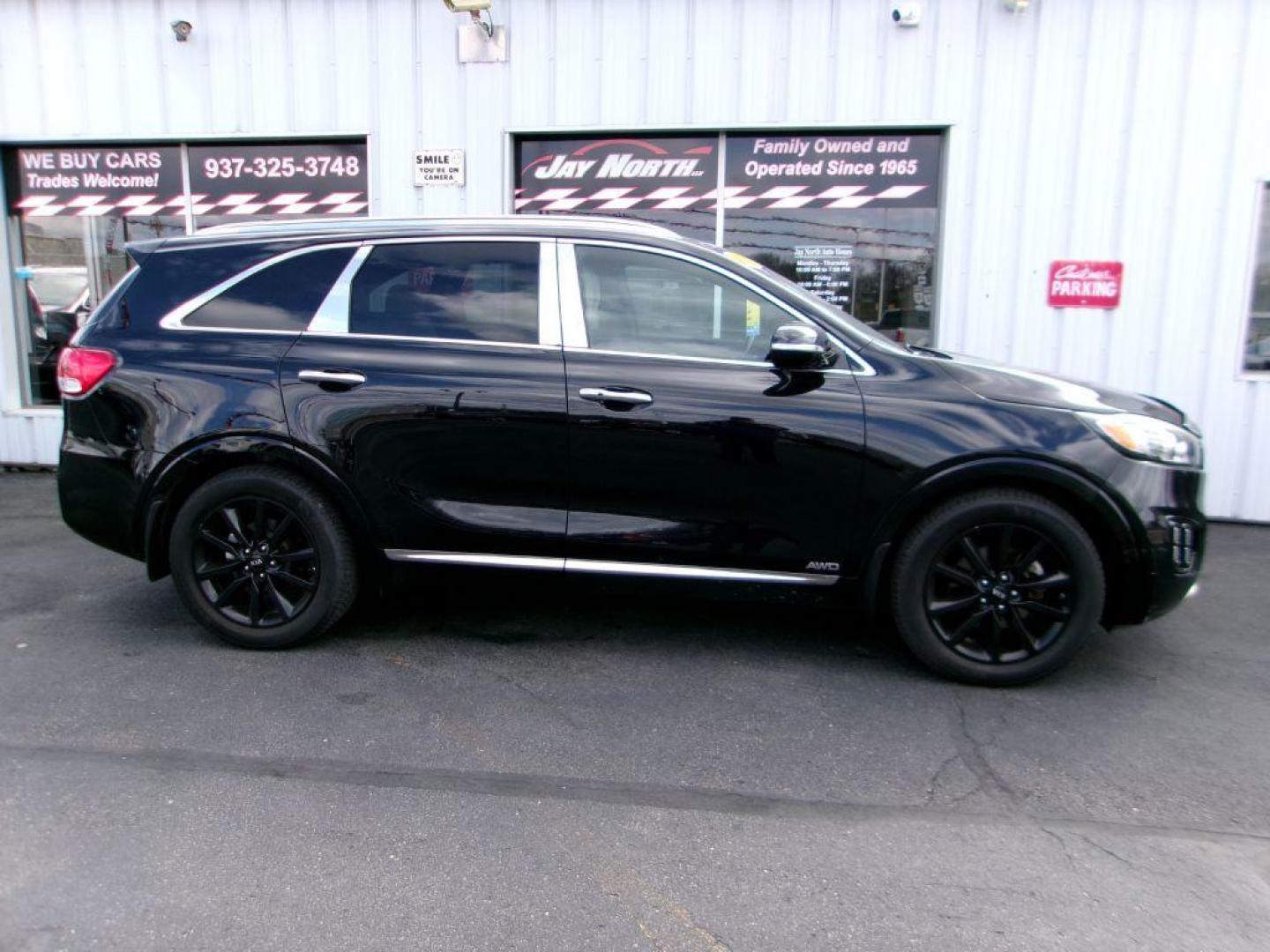 2016 BLACK KIA SORENTO SXL (5XYPKDA53GG) with an 3.3L engine, Automatic transmission, located at 501 E. Columbia St., Springfield, OH, 45503, (800) 262-7122, 39.925262, -83.801796 - Photo#0