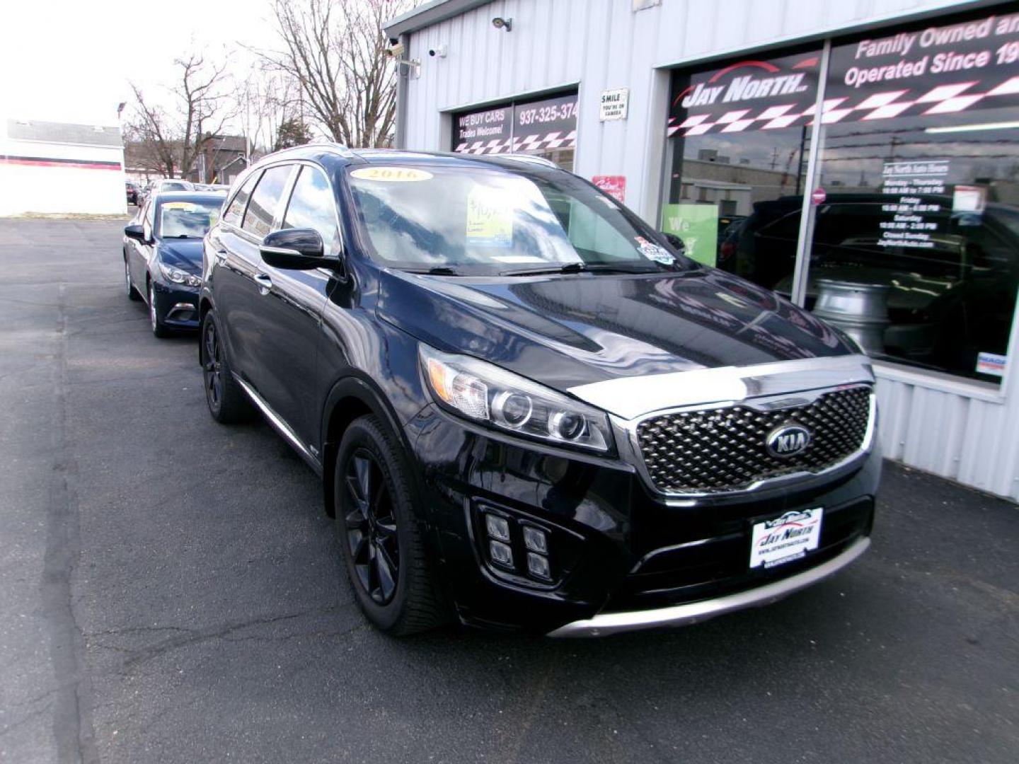 2016 BLACK KIA SORENTO SXL (5XYPKDA53GG) with an 3.3L engine, Automatic transmission, located at 501 E. Columbia St., Springfield, OH, 45503, (800) 262-7122, 39.925262, -83.801796 - Photo#1