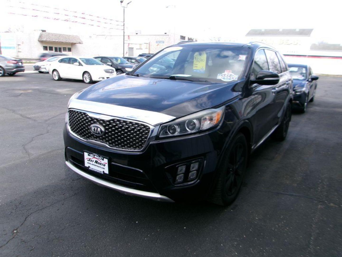 2016 BLACK KIA SORENTO SXL (5XYPKDA53GG) with an 3.3L engine, Automatic transmission, located at 501 E. Columbia St., Springfield, OH, 45503, (800) 262-7122, 39.925262, -83.801796 - Photo#2
