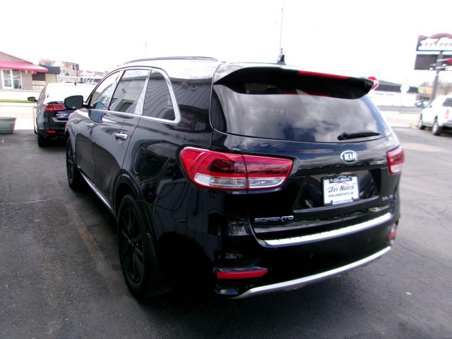 2016 BLACK KIA SORENTO SXL (5XYPKDA53GG) with an 3.3L engine, Automatic transmission, located at 501 E. Columbia St., Springfield, OH, 45503, (800) 262-7122, 39.925262, -83.801796 - Photo#3