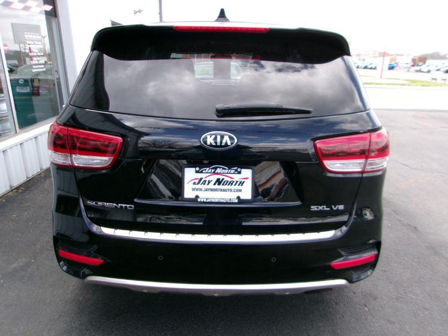 2016 BLACK KIA SORENTO SXL (5XYPKDA53GG) with an 3.3L engine, Automatic transmission, located at 501 E. Columbia St., Springfield, OH, 45503, (800) 262-7122, 39.925262, -83.801796 - Photo#4