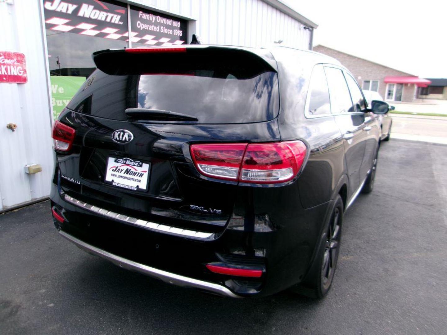 2016 BLACK KIA SORENTO SXL (5XYPKDA53GG) with an 3.3L engine, Automatic transmission, located at 501 E. Columbia St., Springfield, OH, 45503, (800) 262-7122, 39.925262, -83.801796 - Photo#5