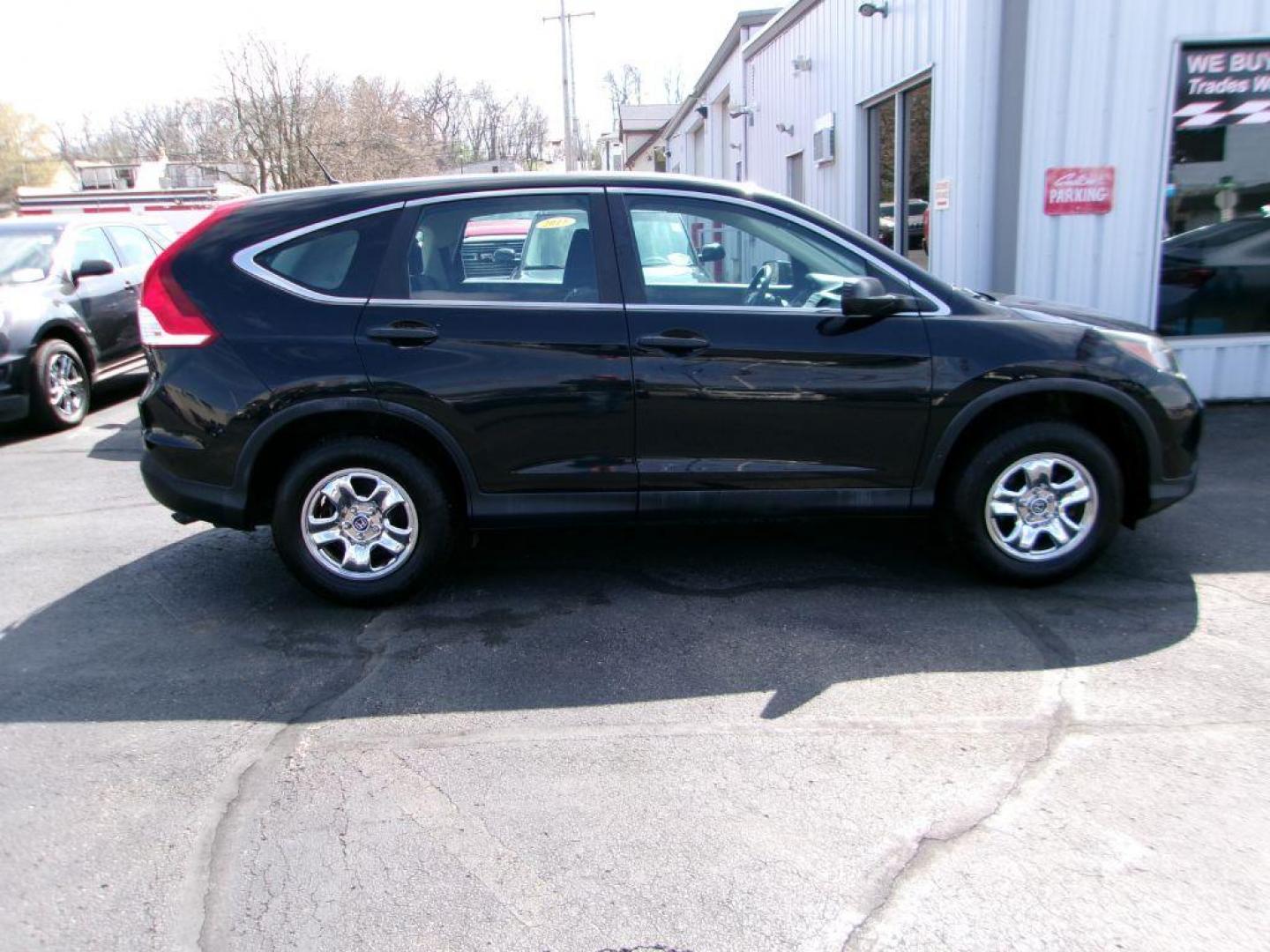 2014 BLACK HONDA CR-V LX (2HKRM4H32EH) with an 2.4L engine, Automatic transmission, located at 501 E. Columbia St., Springfield, OH, 45503, (800) 262-7122, 39.925262, -83.801796 - *** New Timing w/ Honda Parts *** Clean CarFax *** Low Miles *** AWD *** Serviced and Detailed *** Back Up Camera *** Jay North Auto has offered hand picked vehicles since 1965! Our customer's enjoy a NO pressure buying experience with a small town feel. All of our vehicles get fully inspect - Photo#0