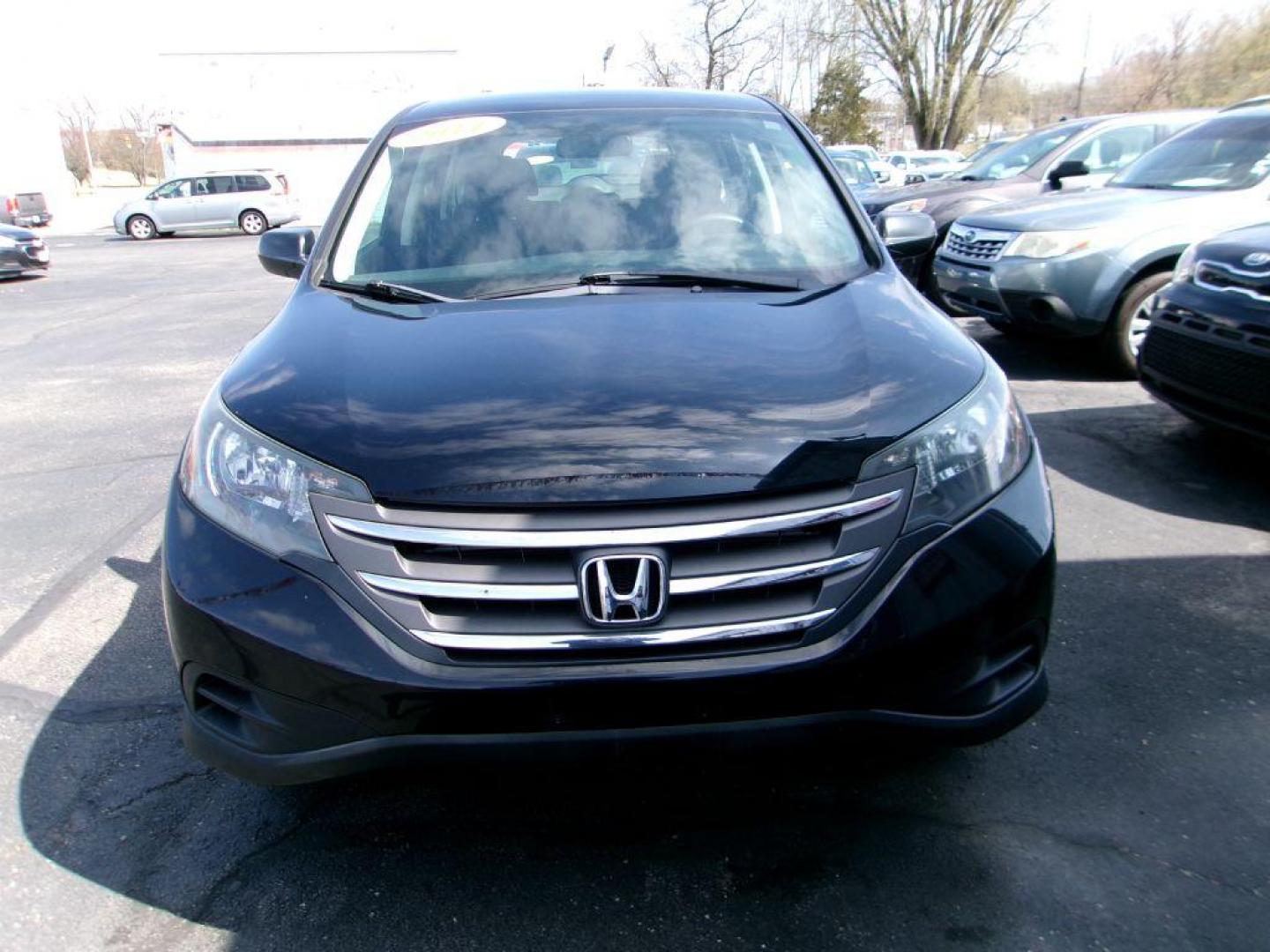 2014 BLACK HONDA CR-V LX (2HKRM4H32EH) with an 2.4L engine, Automatic transmission, located at 501 E. Columbia St., Springfield, OH, 45503, (800) 262-7122, 39.925262, -83.801796 - *** New Timing w/ Honda Parts *** Clean CarFax *** Low Miles *** AWD *** Serviced and Detailed *** Back Up Camera *** Jay North Auto has offered hand picked vehicles since 1965! Our customer's enjoy a NO pressure buying experience with a small town feel. All of our vehicles get fully inspect - Photo#1