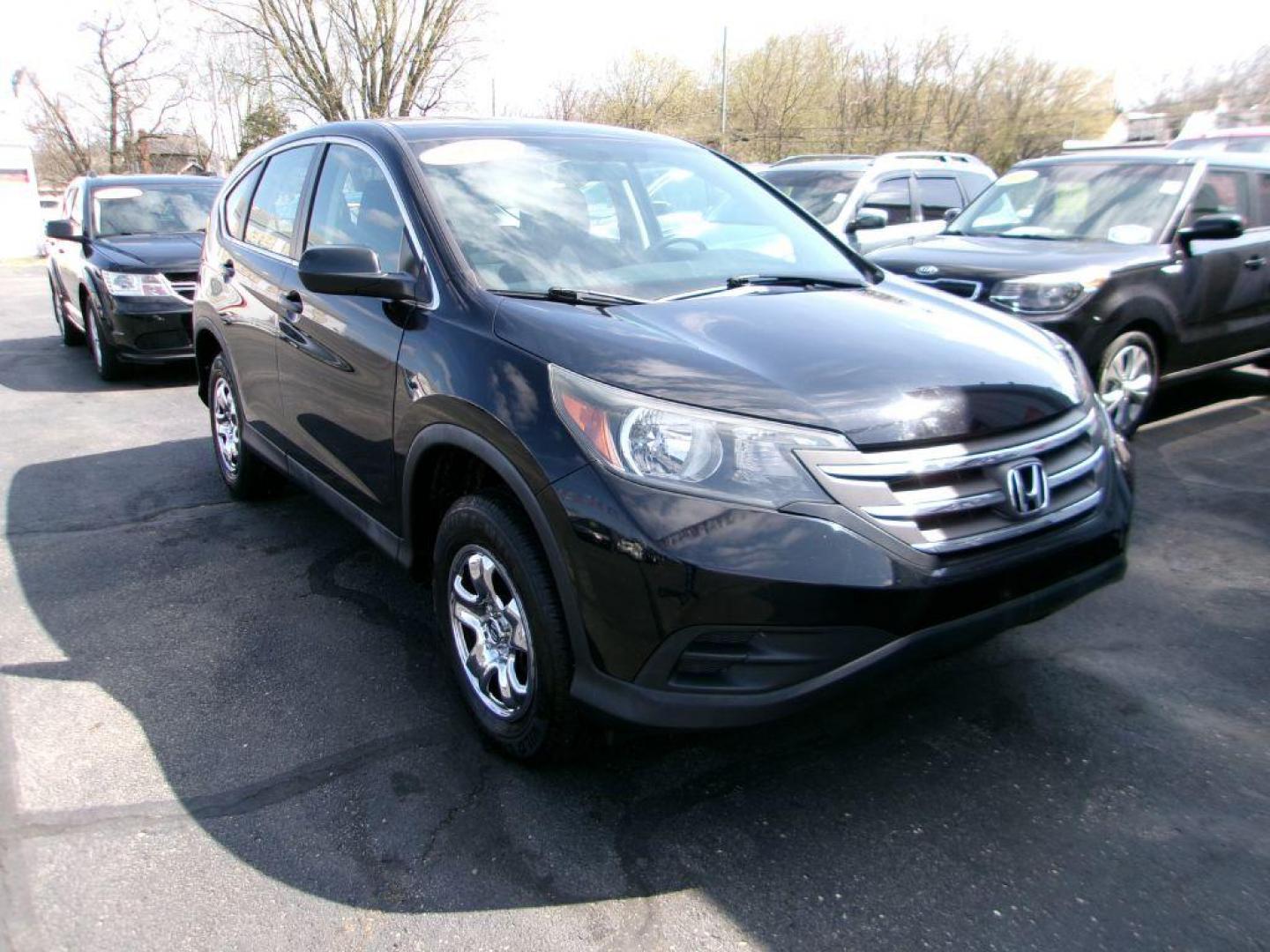 2014 BLACK HONDA CR-V LX (2HKRM4H32EH) with an 2.4L engine, Automatic transmission, located at 501 E. Columbia St., Springfield, OH, 45503, (800) 262-7122, 39.925262, -83.801796 - *** New Timing w/ Honda Parts *** Clean CarFax *** Low Miles *** AWD *** Serviced and Detailed *** Back Up Camera *** Jay North Auto has offered hand picked vehicles since 1965! Our customer's enjoy a NO pressure buying experience with a small town feel. All of our vehicles get fully inspect - Photo#2