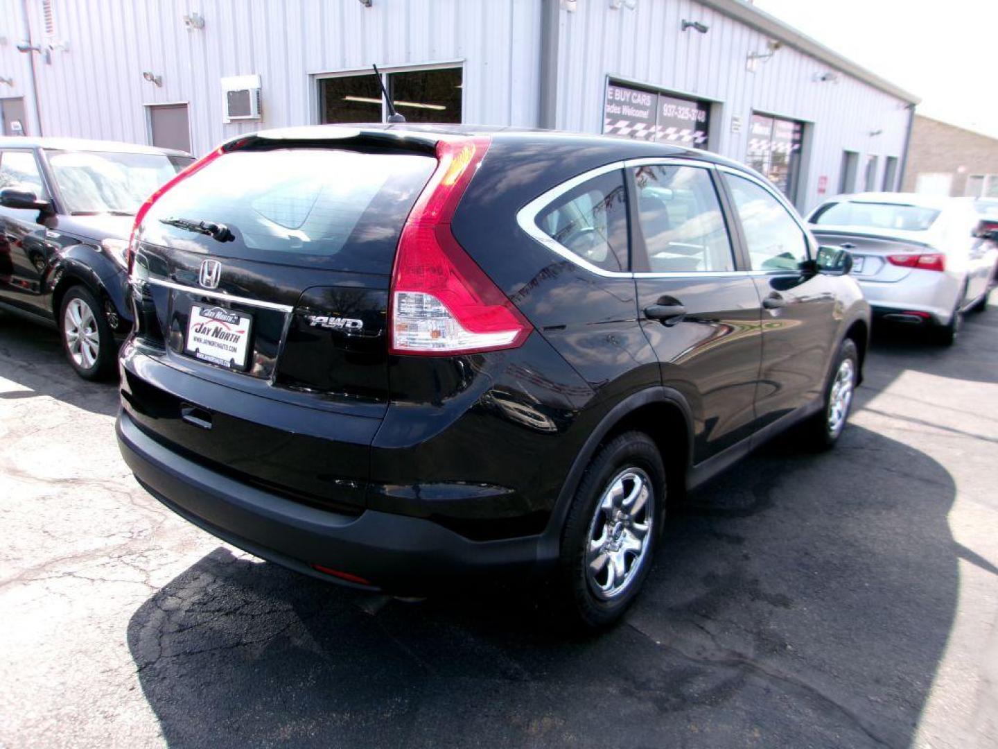2014 BLACK HONDA CR-V LX (2HKRM4H32EH) with an 2.4L engine, Automatic transmission, located at 501 E. Columbia St., Springfield, OH, 45503, (800) 262-7122, 39.925262, -83.801796 - *** New Timing w/ Honda Parts *** Clean CarFax *** Low Miles *** AWD *** Serviced and Detailed *** Back Up Camera *** Jay North Auto has offered hand picked vehicles since 1965! Our customer's enjoy a NO pressure buying experience with a small town feel. All of our vehicles get fully inspect - Photo#3