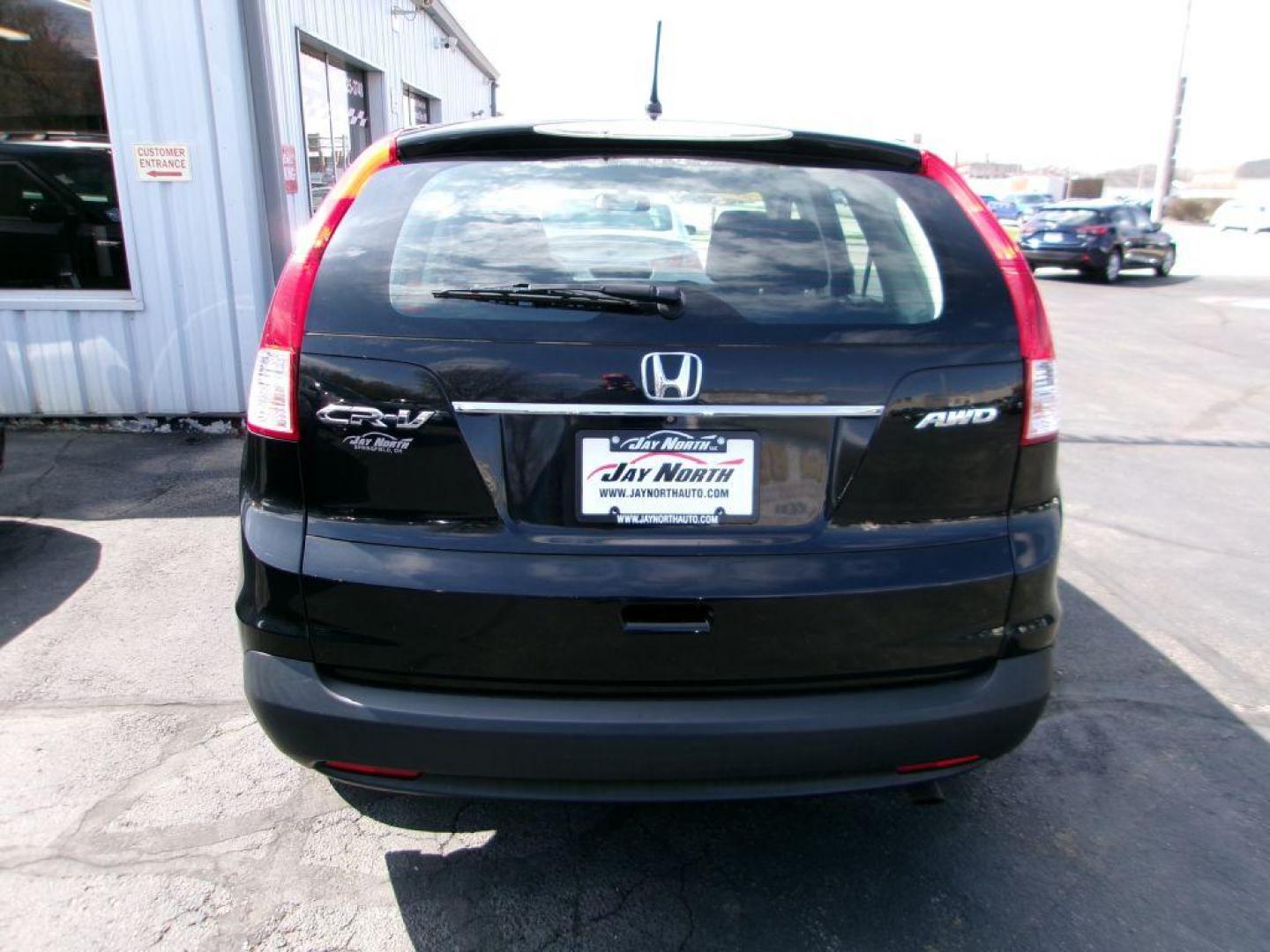 2014 BLACK HONDA CR-V LX (2HKRM4H32EH) with an 2.4L engine, Automatic transmission, located at 501 E. Columbia St., Springfield, OH, 45503, (800) 262-7122, 39.925262, -83.801796 - *** New Timing w/ Honda Parts *** Clean CarFax *** Low Miles *** AWD *** Serviced and Detailed *** Back Up Camera *** Jay North Auto has offered hand picked vehicles since 1965! Our customer's enjoy a NO pressure buying experience with a small town feel. All of our vehicles get fully inspect - Photo#4