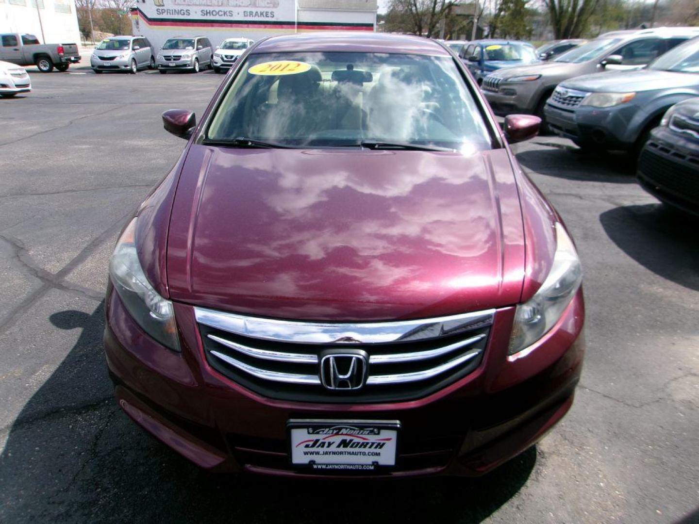 2012 RED HONDA ACCORD LXP (1HGCP2F49CA) with an 2.4L engine, Automatic transmission, located at 501 E. Columbia St., Springfield, OH, 45503, (800) 262-7122, 39.925262, -83.801796 - *** Serviced and Detailed *** FWD *** LX *** Clean CarFax *** Jay North Auto has offered hand picked vehicles since 1965! Our customer's enjoy a NO pressure buying experience with a small town feel. All of our vehicles get fully inspected and detailed. We are a preferred dealer for many local c - Photo#2