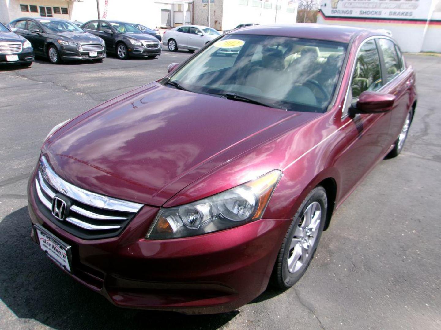 2012 RED HONDA ACCORD LXP (1HGCP2F49CA) with an 2.4L engine, Automatic transmission, located at 501 E. Columbia St., Springfield, OH, 45503, (800) 262-7122, 39.925262, -83.801796 - *** Serviced and Detailed *** FWD *** LX *** Clean CarFax *** Jay North Auto has offered hand picked vehicles since 1965! Our customer's enjoy a NO pressure buying experience with a small town feel. All of our vehicles get fully inspected and detailed. We are a preferred dealer for many local c - Photo#3