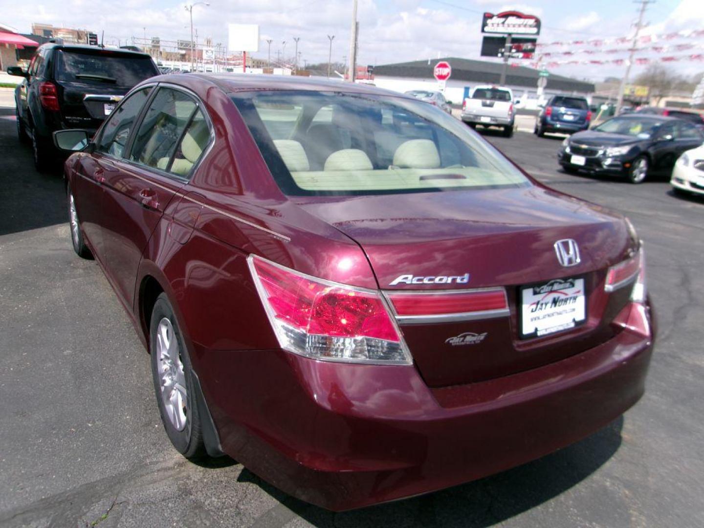 2012 RED HONDA ACCORD LXP (1HGCP2F49CA) with an 2.4L engine, Automatic transmission, located at 501 E. Columbia St., Springfield, OH, 45503, (800) 262-7122, 39.925262, -83.801796 - *** Serviced and Detailed *** FWD *** LX *** Clean CarFax *** Jay North Auto has offered hand picked vehicles since 1965! Our customer's enjoy a NO pressure buying experience with a small town feel. All of our vehicles get fully inspected and detailed. We are a preferred dealer for many local c - Photo#4