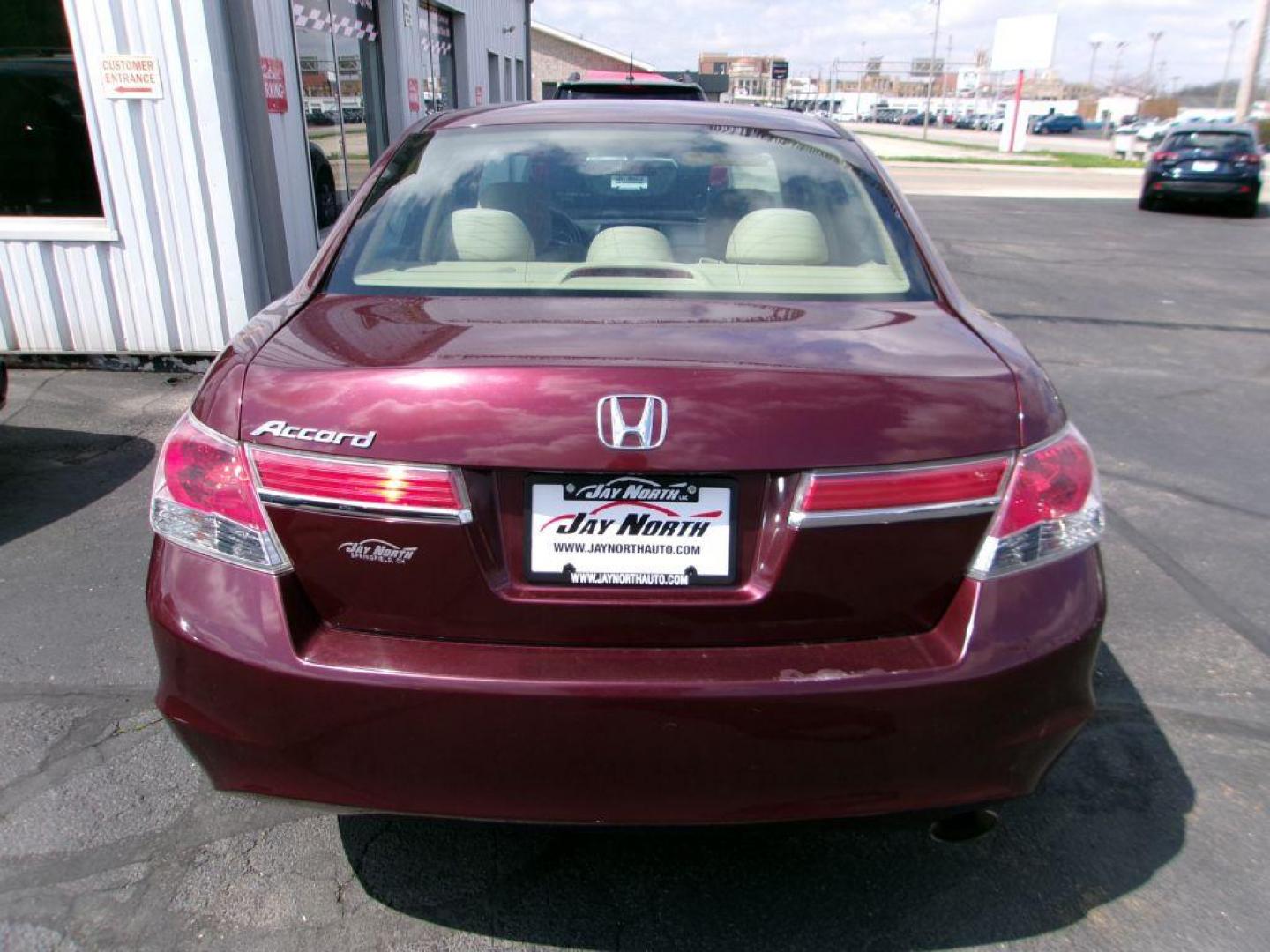 2012 RED HONDA ACCORD LXP (1HGCP2F49CA) with an 2.4L engine, Automatic transmission, located at 501 E. Columbia St., Springfield, OH, 45503, (800) 262-7122, 39.925262, -83.801796 - *** Serviced and Detailed *** FWD *** LX *** Clean CarFax *** Jay North Auto has offered hand picked vehicles since 1965! Our customer's enjoy a NO pressure buying experience with a small town feel. All of our vehicles get fully inspected and detailed. We are a preferred dealer for many local c - Photo#5