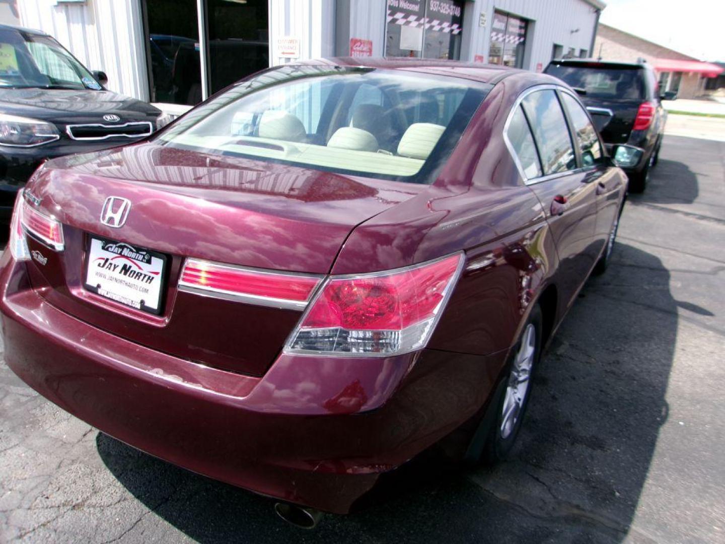 2012 RED HONDA ACCORD LXP (1HGCP2F49CA) with an 2.4L engine, Automatic transmission, located at 501 E. Columbia St., Springfield, OH, 45503, (800) 262-7122, 39.925262, -83.801796 - *** Serviced and Detailed *** FWD *** LX *** Clean CarFax *** Jay North Auto has offered hand picked vehicles since 1965! Our customer's enjoy a NO pressure buying experience with a small town feel. All of our vehicles get fully inspected and detailed. We are a preferred dealer for many local c - Photo#6