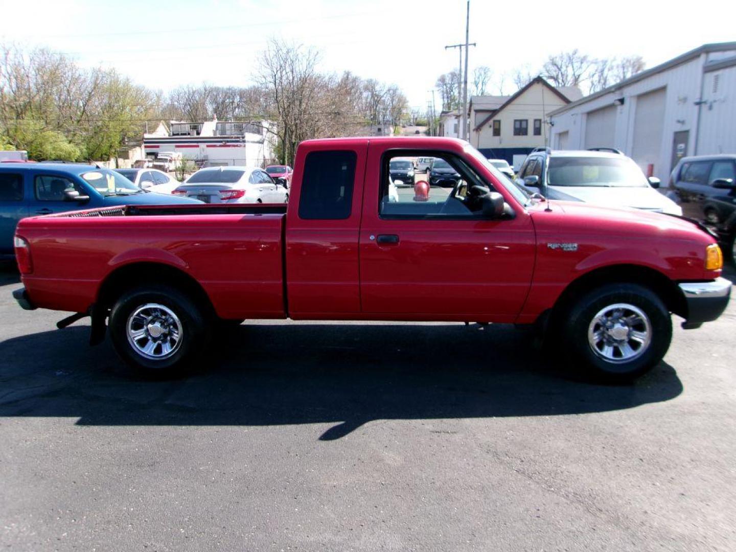 2001 RED FORD RANGER SUPER CAB (1FTYR14U71T) with an 3.0L engine, Automatic transmission, located at 501 E. Columbia St., Springfield, OH, 45503, (800) 262-7122, 39.925262, -83.801796 - *** Local Trade in *** Serviced and Detailed *** Power Windows and Locks *** Bedliner *** Sliding Rear Window *** 4 Door *** 3.0L V6 *** Jay North Auto has offered hand picked vehicles since 1965! Our customer's enjoy a NO pressure buying experience with a small town feel. All of our vehicles g - Photo#0