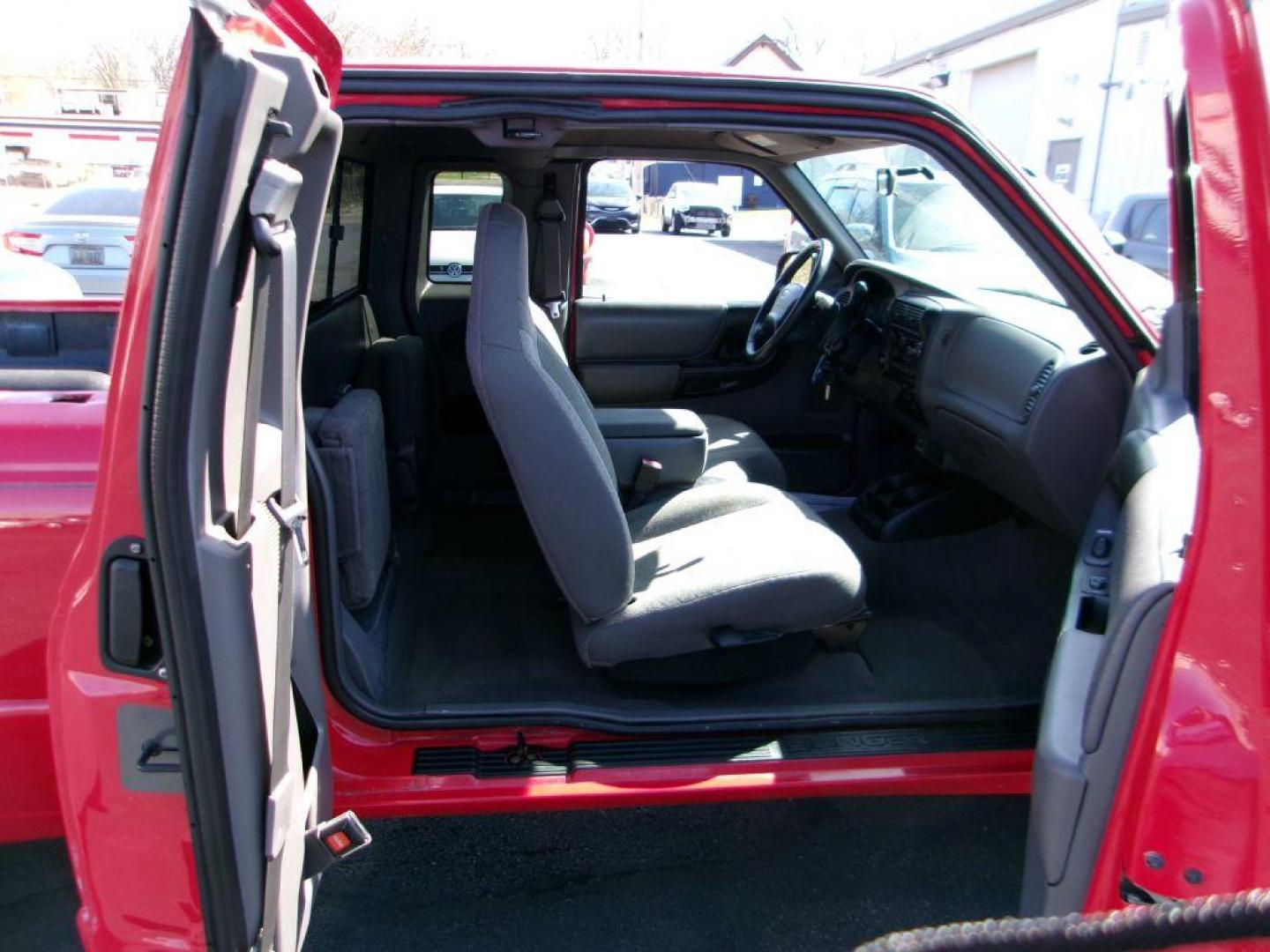2001 RED FORD RANGER SUPER CAB (1FTYR14U71T) with an 3.0L engine, Automatic transmission, located at 501 E. Columbia St., Springfield, OH, 45503, (800) 262-7122, 39.925262, -83.801796 - *** Local Trade in *** Serviced and Detailed *** Power Windows and Locks *** Bedliner *** Sliding Rear Window *** 4 Door *** 3.0L V6 *** Jay North Auto has offered hand picked vehicles since 1965! Our customer's enjoy a NO pressure buying experience with a small town feel. All of our vehicles g - Photo#12