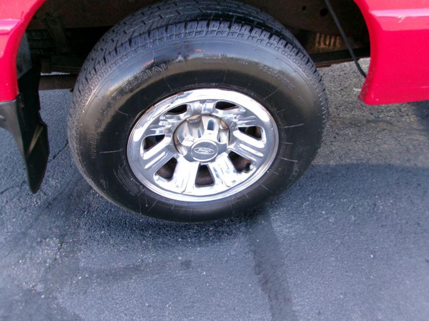 2001 RED FORD RANGER SUPER CAB (1FTYR14U71T) with an 3.0L engine, Automatic transmission, located at 501 E. Columbia St., Springfield, OH, 45503, (800) 262-7122, 39.925262, -83.801796 - *** Local Trade in *** Serviced and Detailed *** Power Windows and Locks *** Bedliner *** Sliding Rear Window *** 4 Door *** 3.0L V6 *** Jay North Auto has offered hand picked vehicles since 1965! Our customer's enjoy a NO pressure buying experience with a small town feel. All of our vehicles g - Photo#16