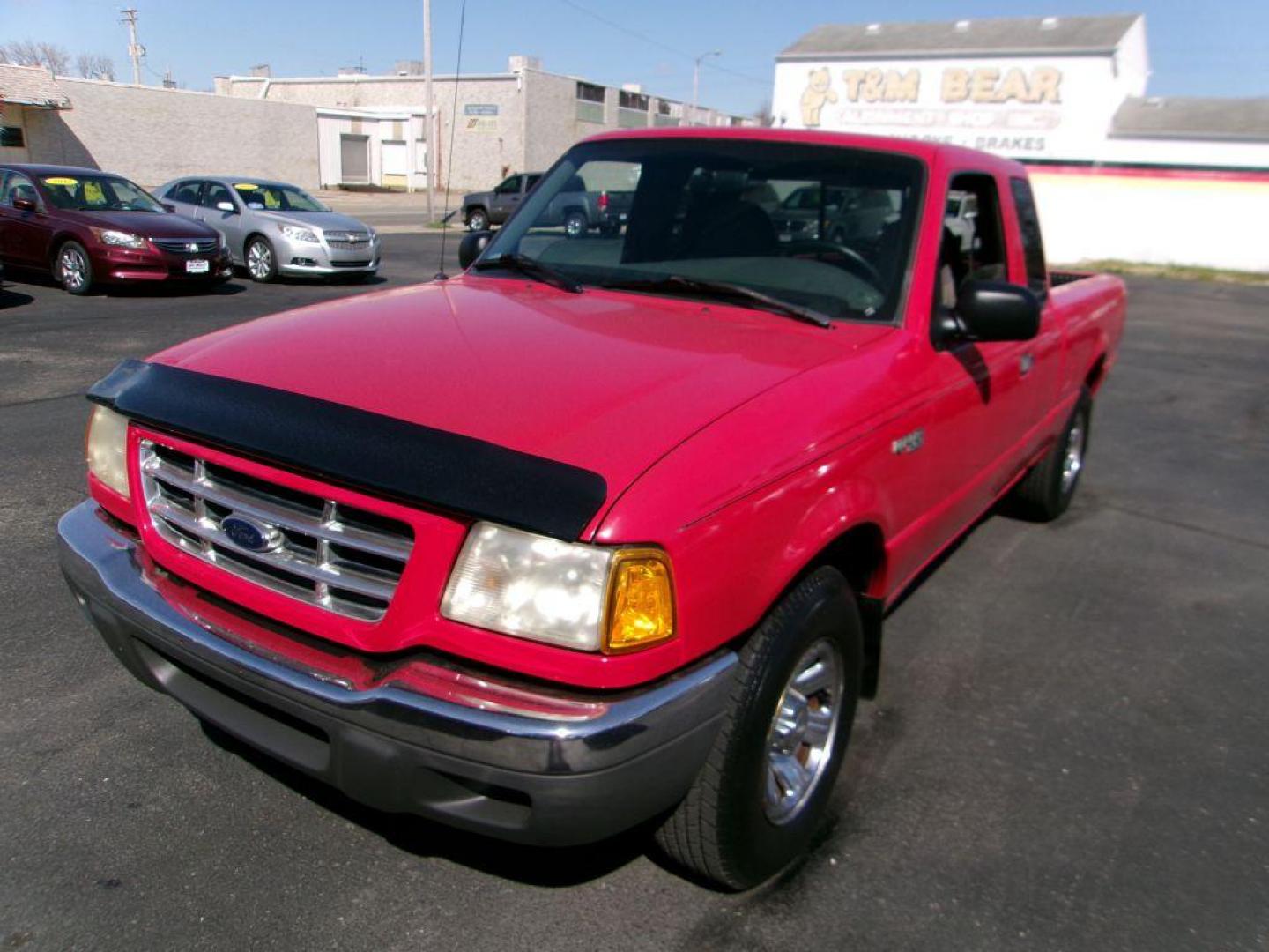 2001 RED FORD RANGER SUPER CAB (1FTYR14U71T) with an 3.0L engine, Automatic transmission, located at 501 E. Columbia St., Springfield, OH, 45503, (800) 262-7122, 39.925262, -83.801796 - *** Local Trade in *** Serviced and Detailed *** Power Windows and Locks *** Bedliner *** Sliding Rear Window *** 4 Door *** 3.0L V6 *** Jay North Auto has offered hand picked vehicles since 1965! Our customer's enjoy a NO pressure buying experience with a small town feel. All of our vehicles g - Photo#3