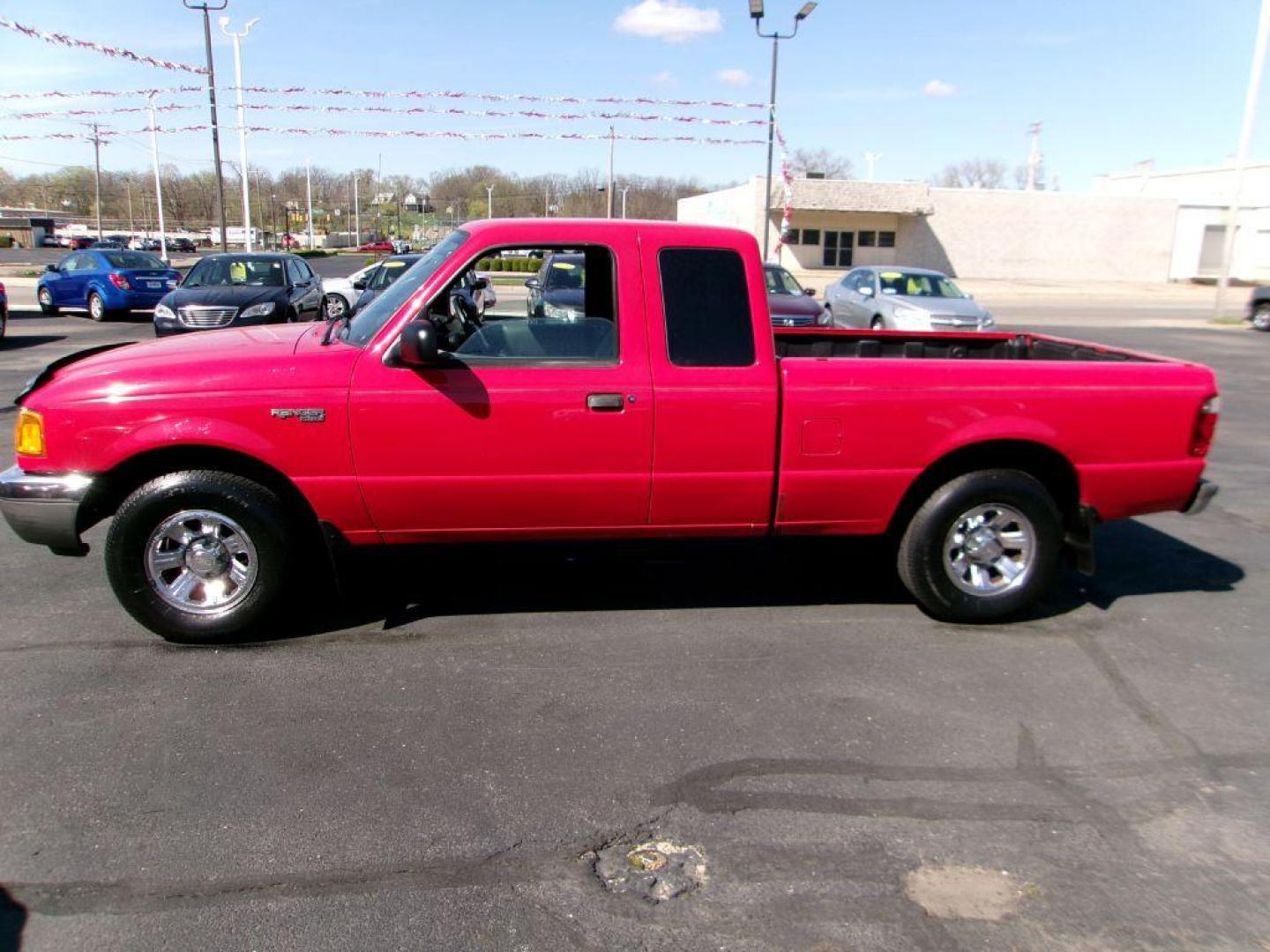 2001 RED FORD RANGER SUPER CAB (1FTYR14U71T) with an 3.0L engine, Automatic transmission, located at 501 E. Columbia St., Springfield, OH, 45503, (800) 262-7122, 39.925262, -83.801796 - *** Local Trade in *** Serviced and Detailed *** Power Windows and Locks *** Bedliner *** Sliding Rear Window *** 4 Door *** 3.0L V6 *** Jay North Auto has offered hand picked vehicles since 1965! Our customer's enjoy a NO pressure buying experience with a small town feel. All of our vehicles g - Photo#4